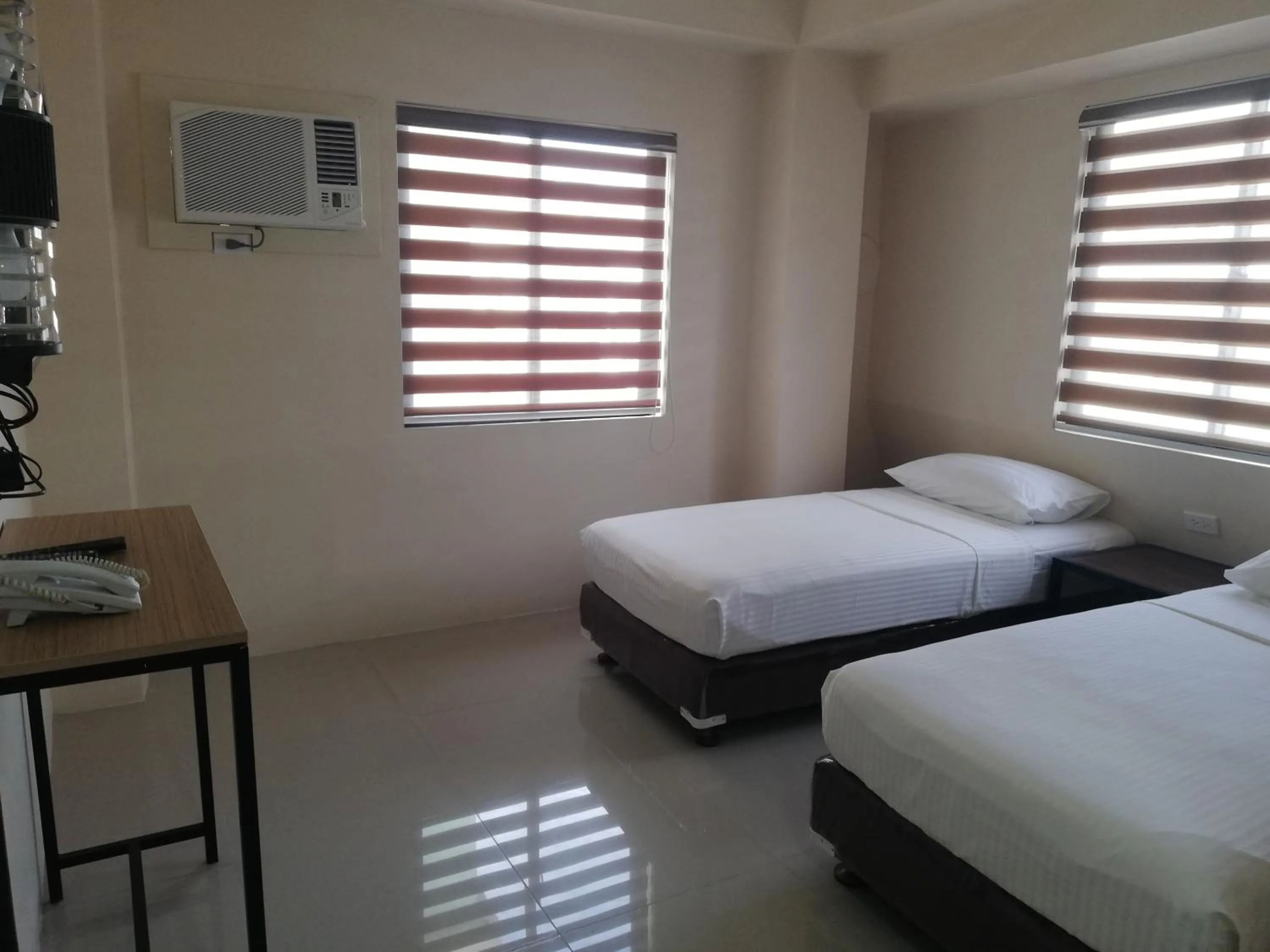 Bed in Eon Centennial Express Hotel