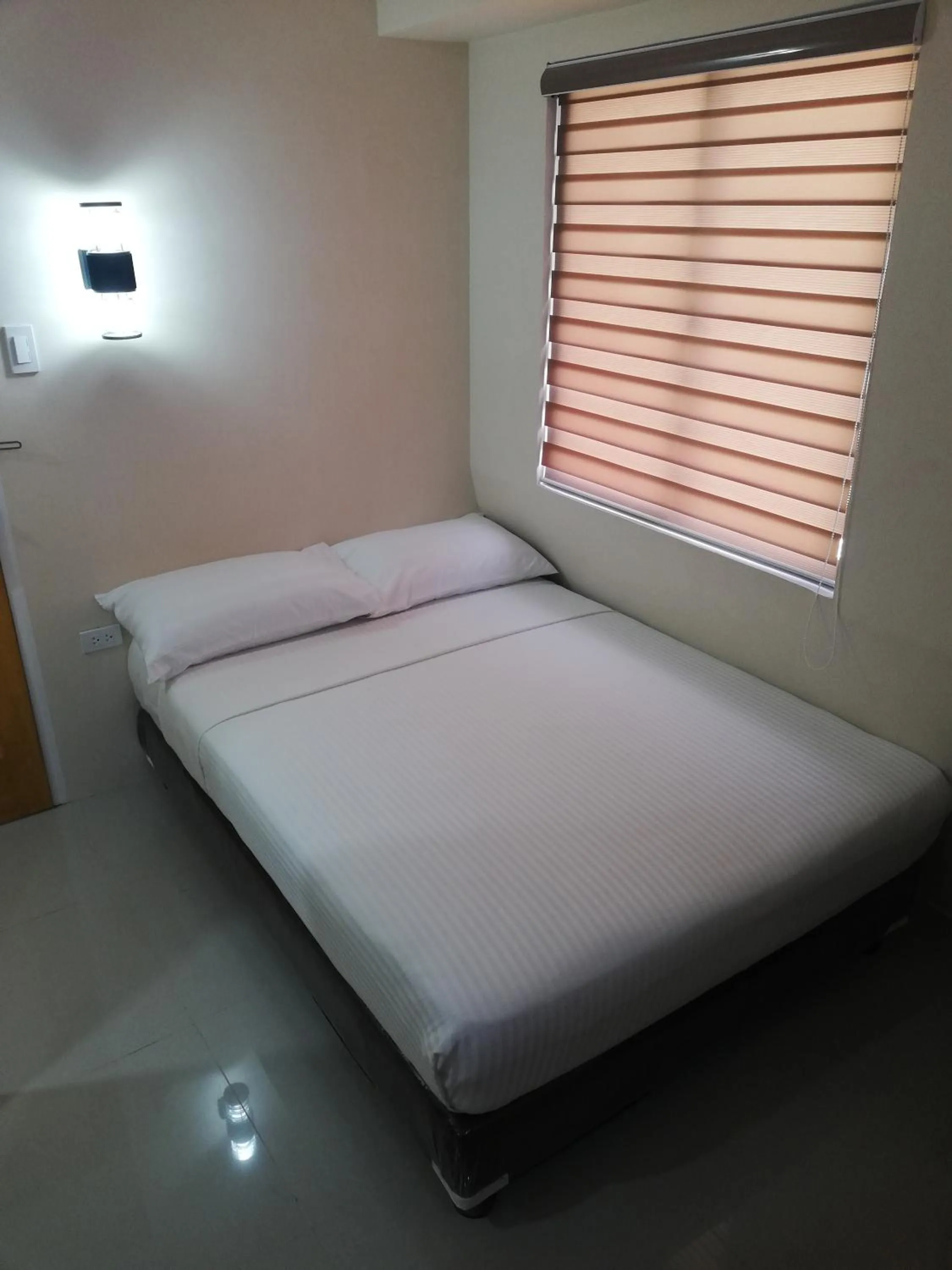 Bed in Eon Centennial Express Hotel