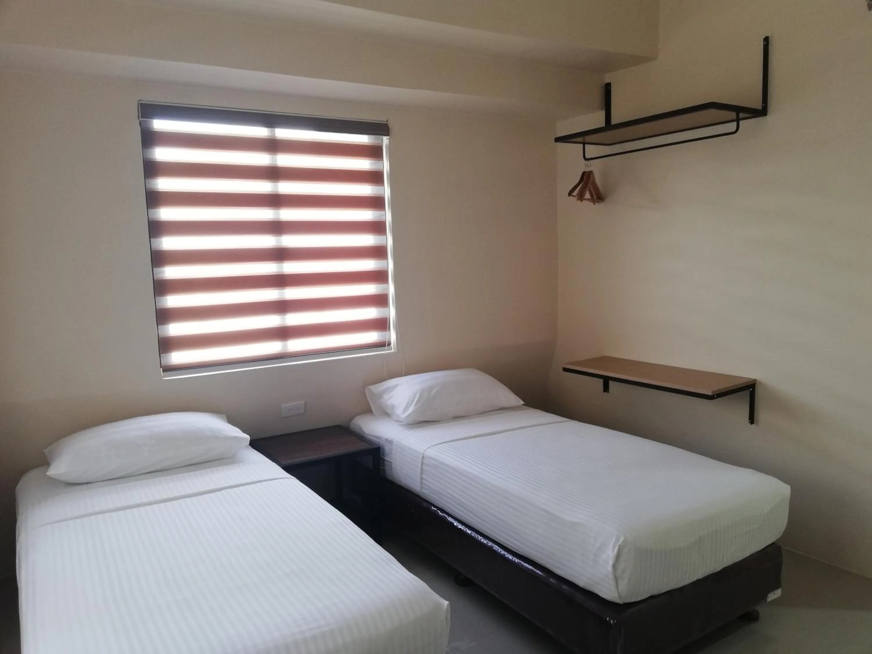 Bed in Eon Centennial Express Hotel