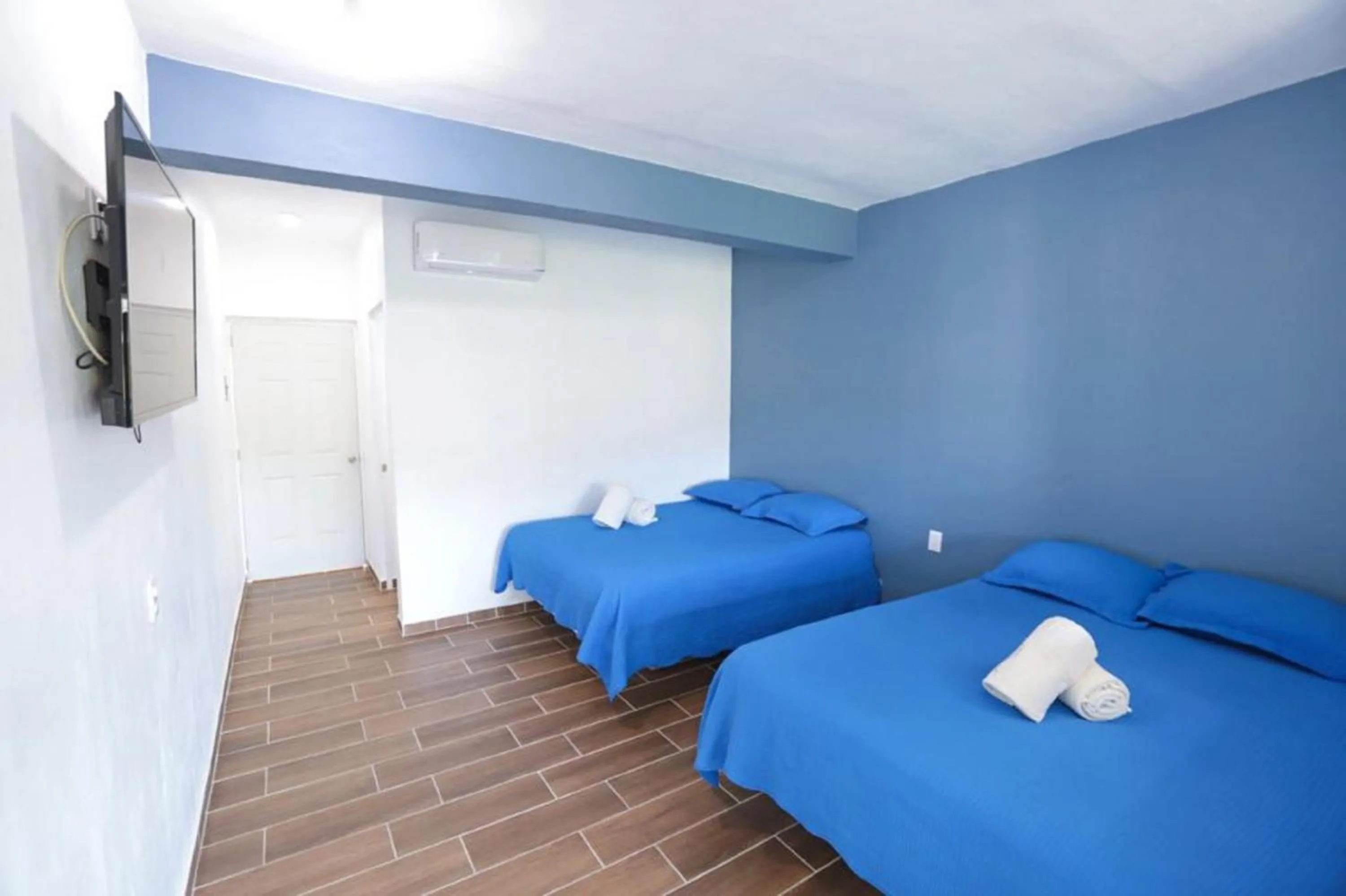 Bedroom, Bed in Hotel Rega Suites Guayabitos - Family & Kitchen