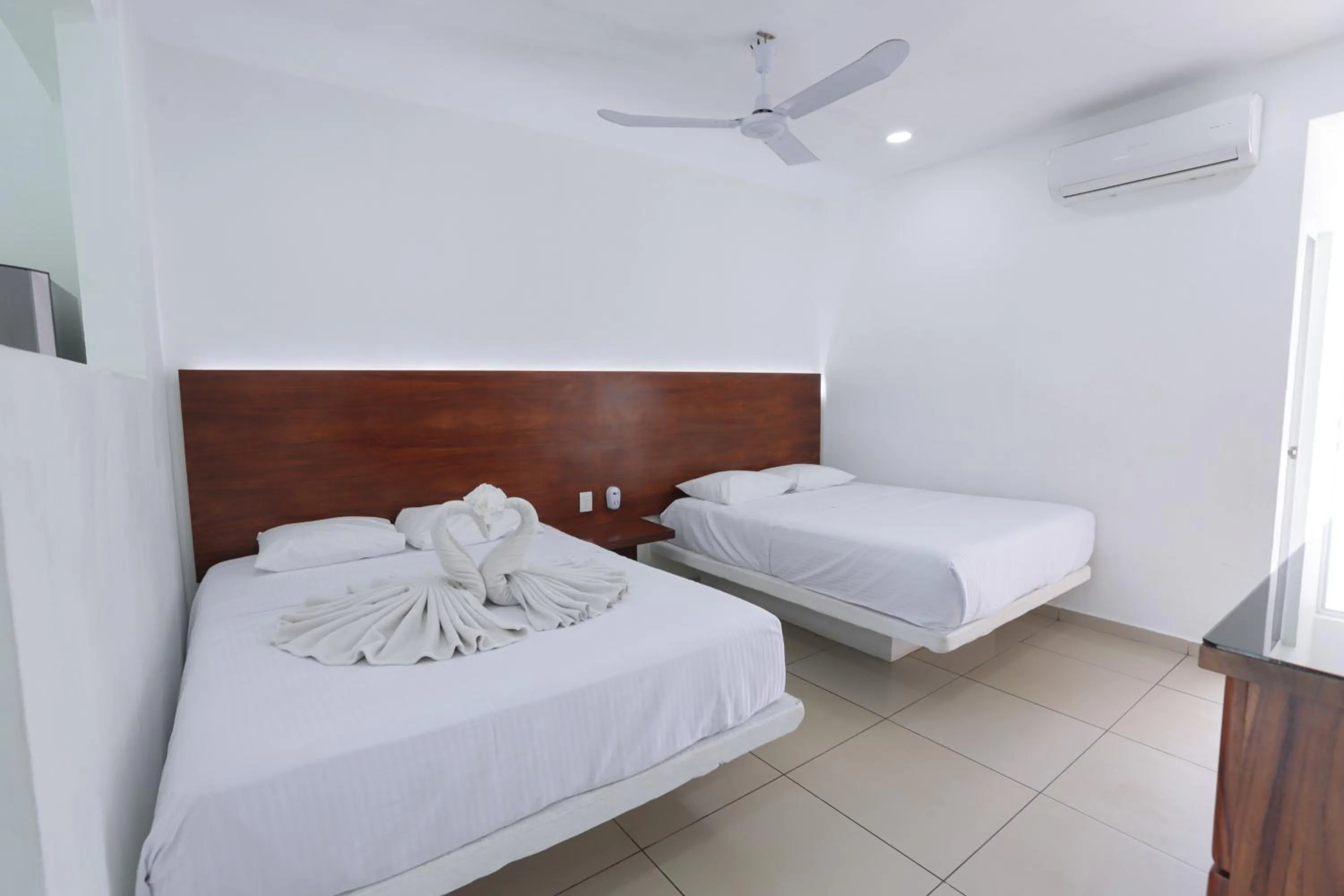 Bedroom, Bed in Hotel Rega Suites Guayabitos - Family & Kitchen