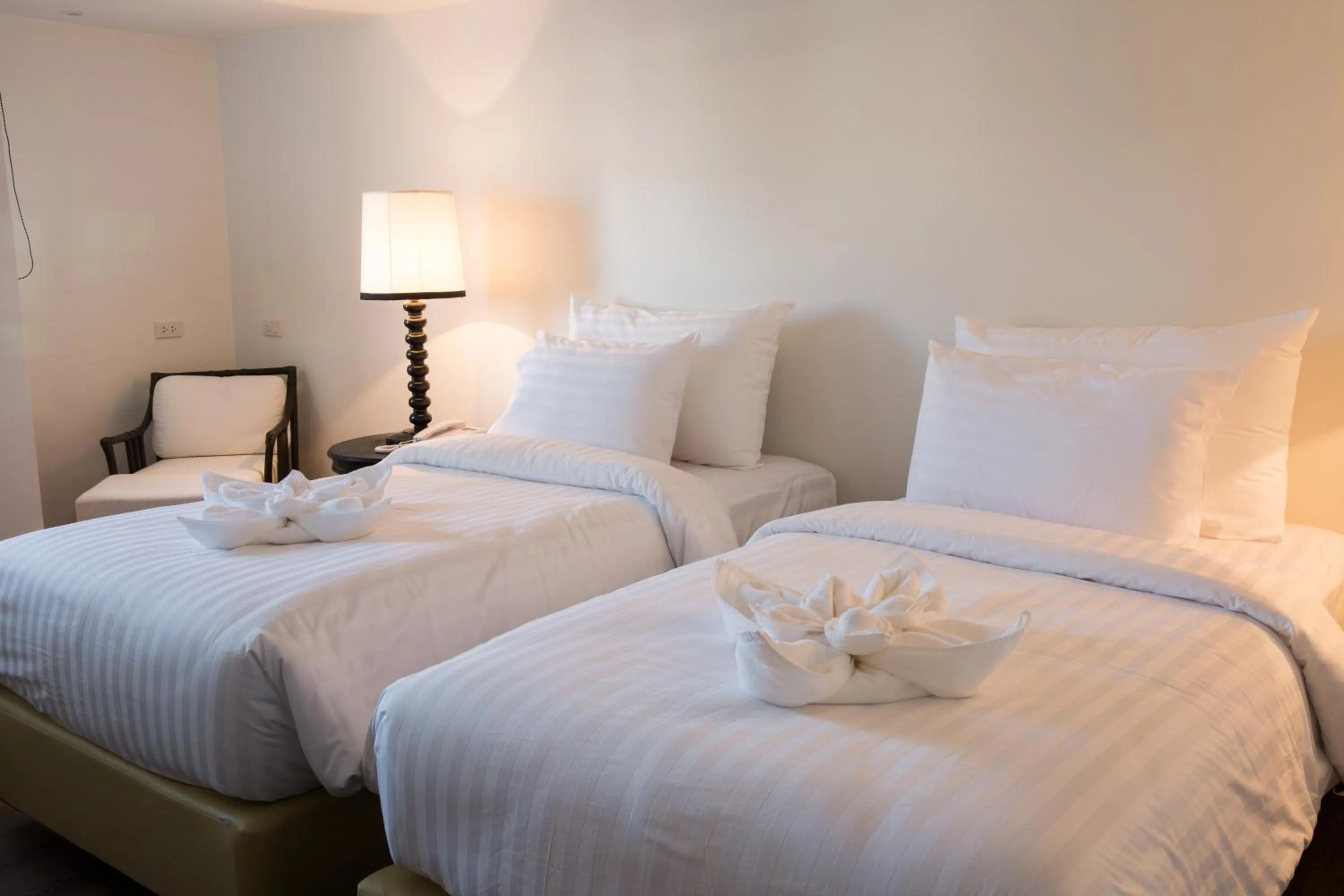 Bed in MORA Boutique Hotel