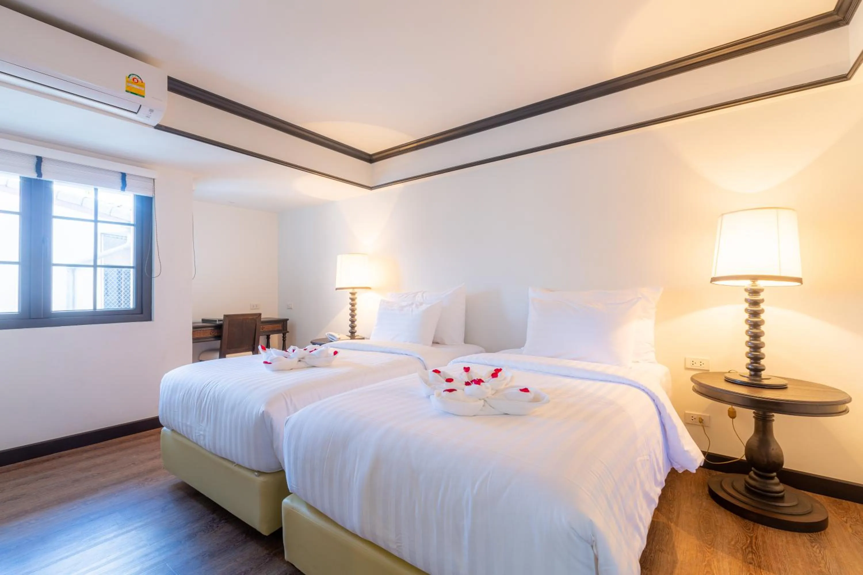 Bed in MORA Boutique Hotel