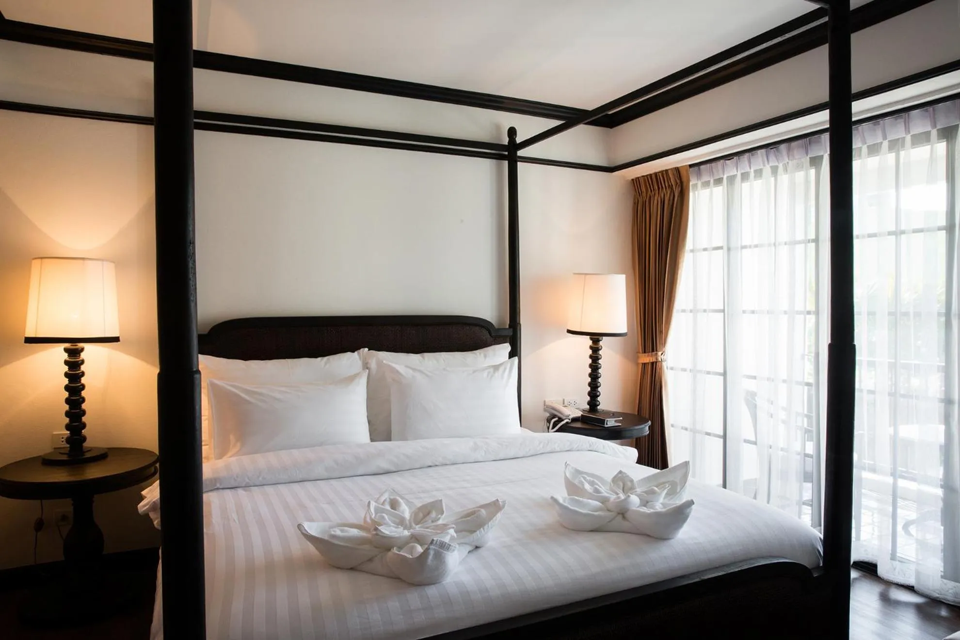 Bed in MORA Boutique Hotel