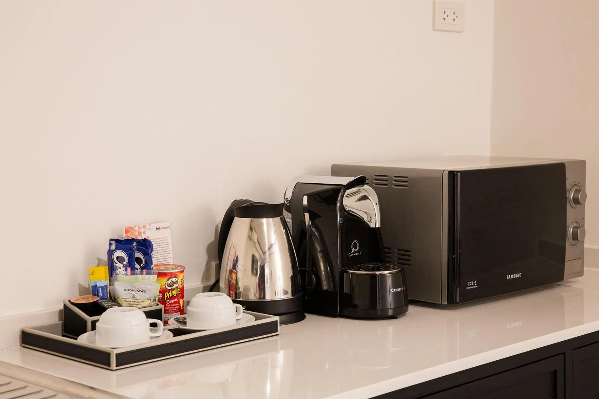 Kitchen or kitchenette in MORA Boutique Hotel