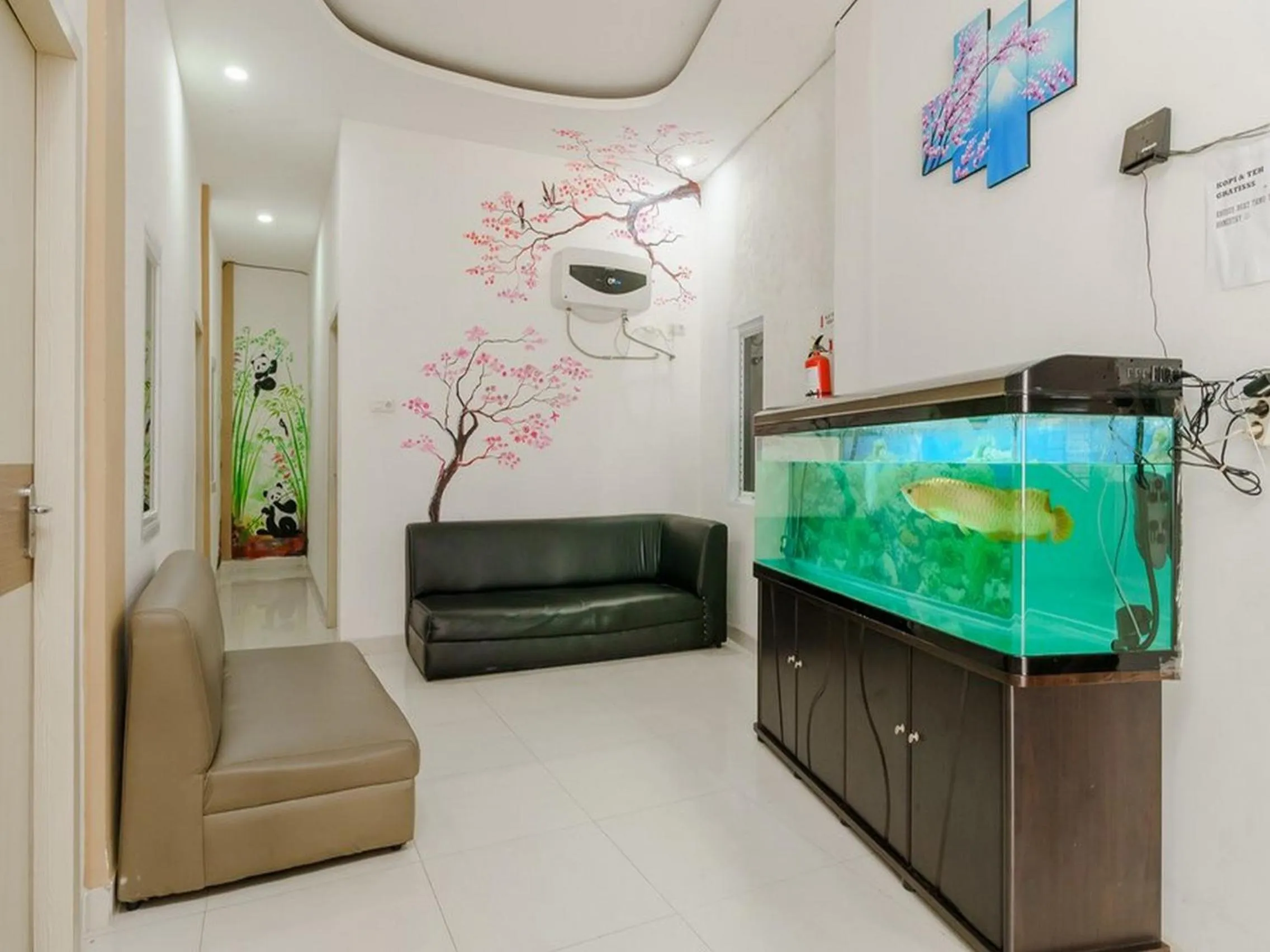 Seating area in RedDoorz at Tara Homestay Palembang