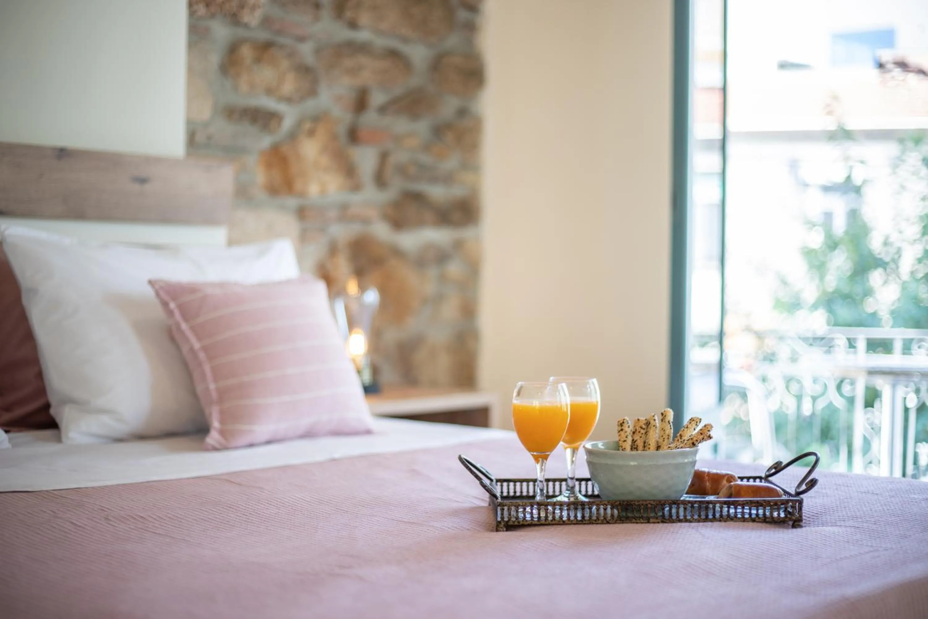 Bed in Ancient Agora Apartments