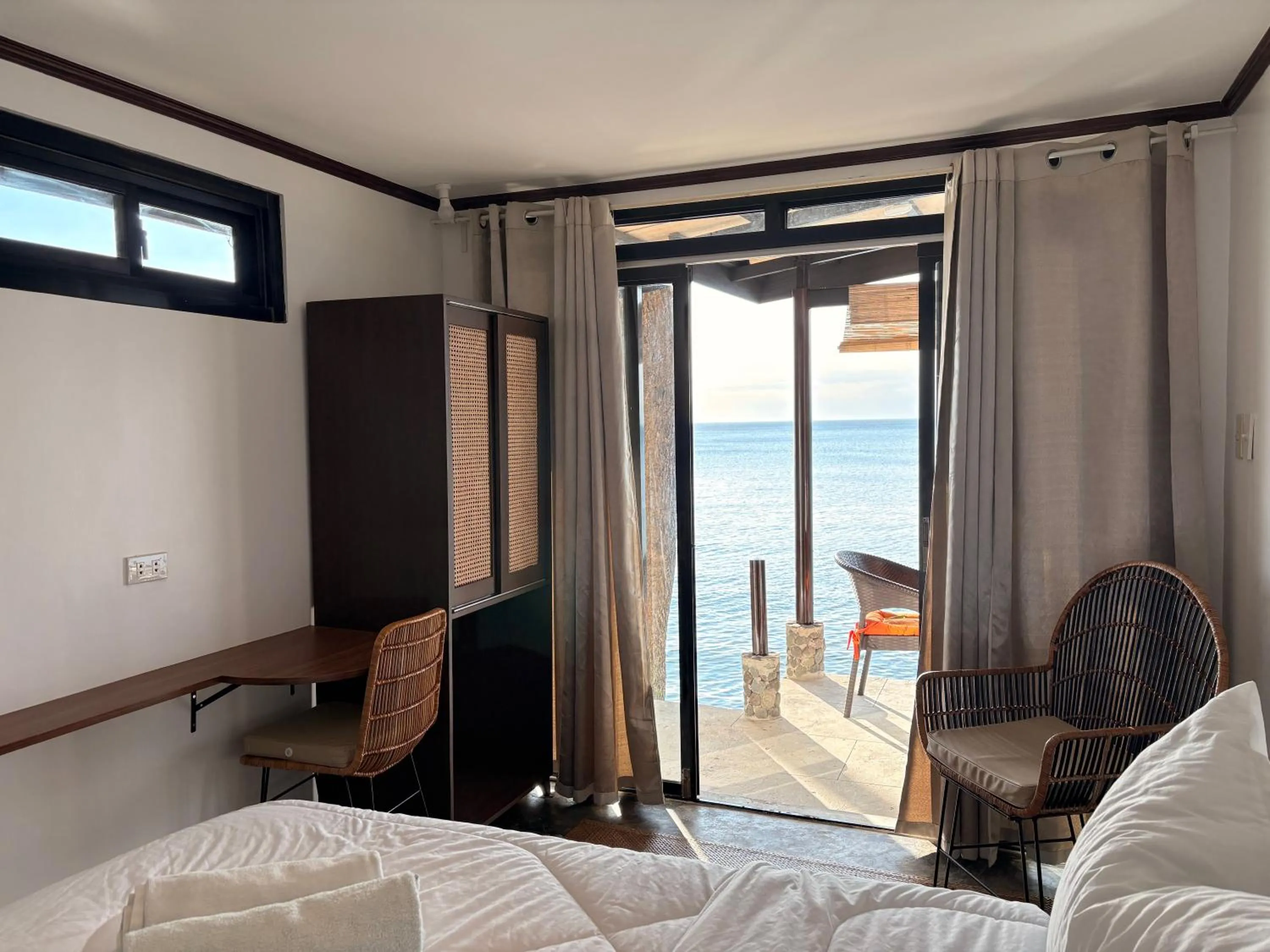 Seating area, Bed in Villa Milagros Dive Inn Anilao