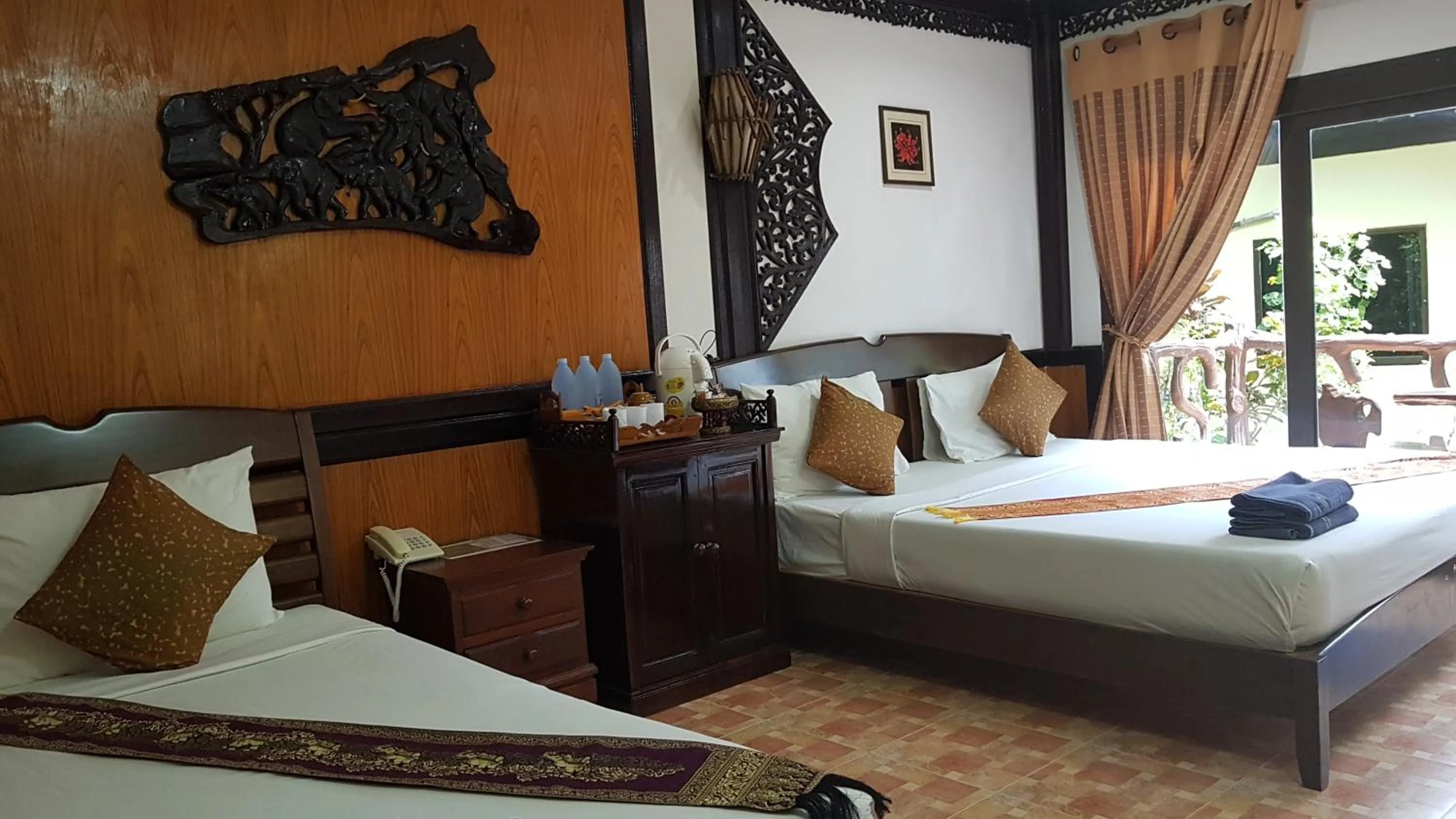 Bed in Paradise Pearl Bungalows