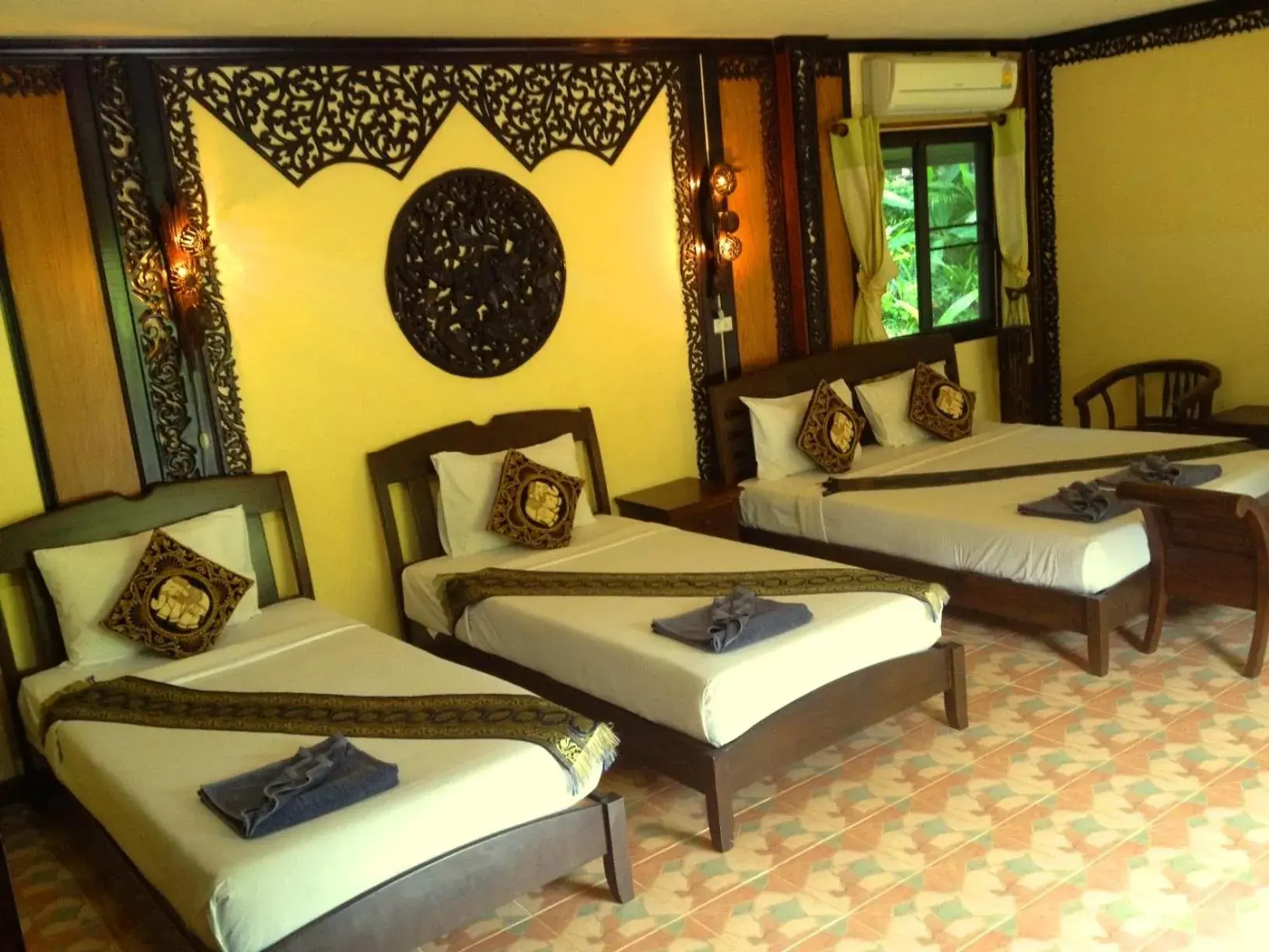 Quadruple Room with Garden View in Paradise Pearl Bungalows Quadruple Room with Garden View in Paradise Pearl Bungalows