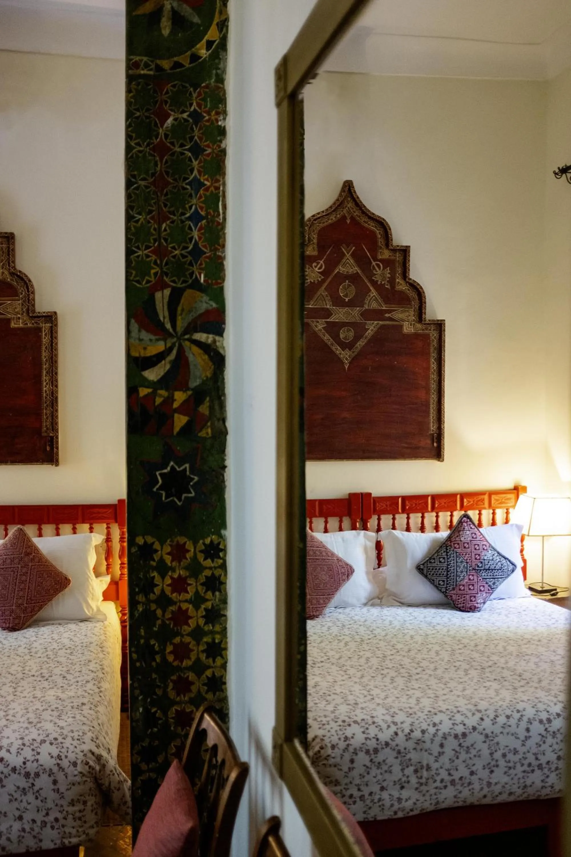 Bed in Riad Le Coq Berbère