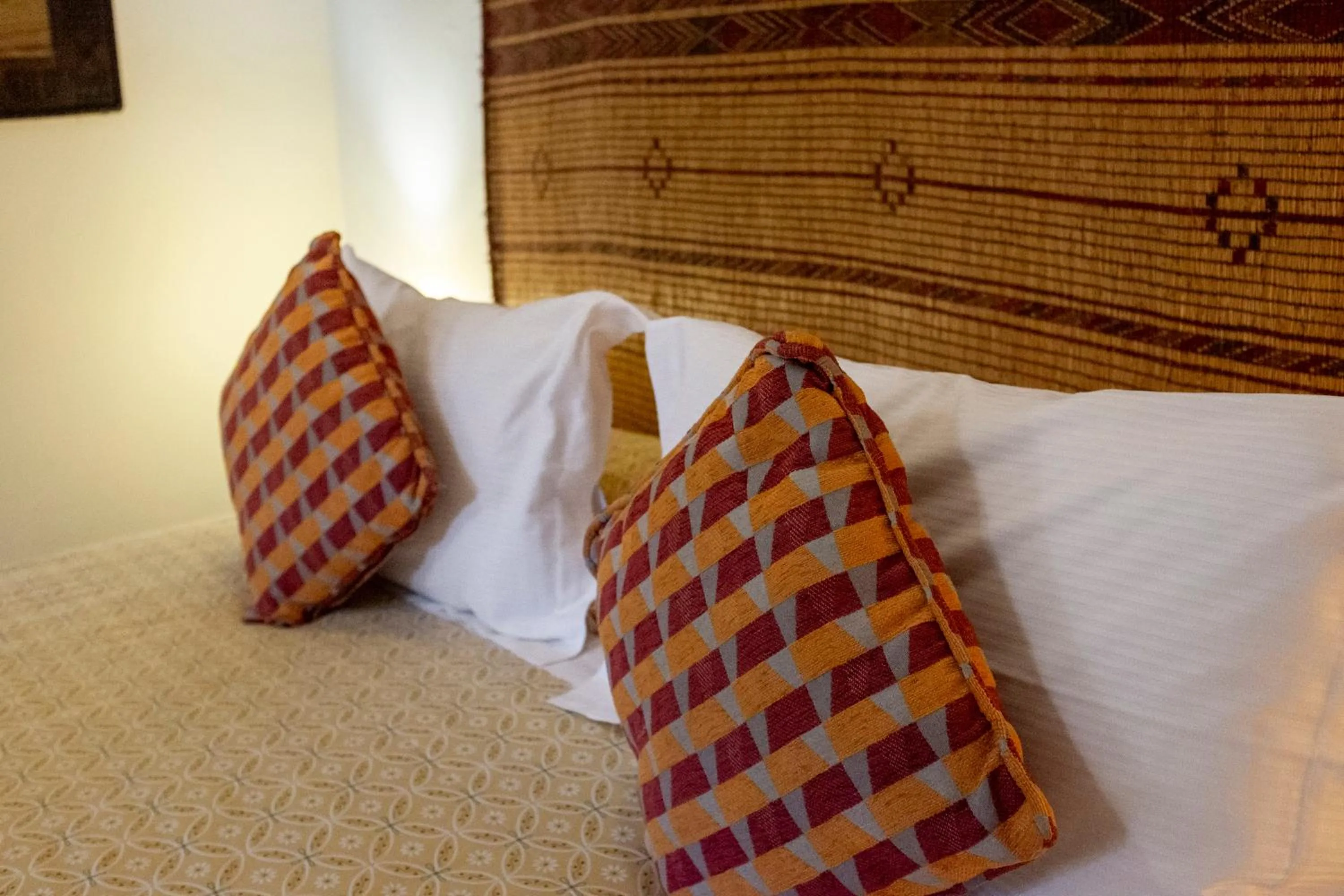 Bed in Riad Le Coq Berbère