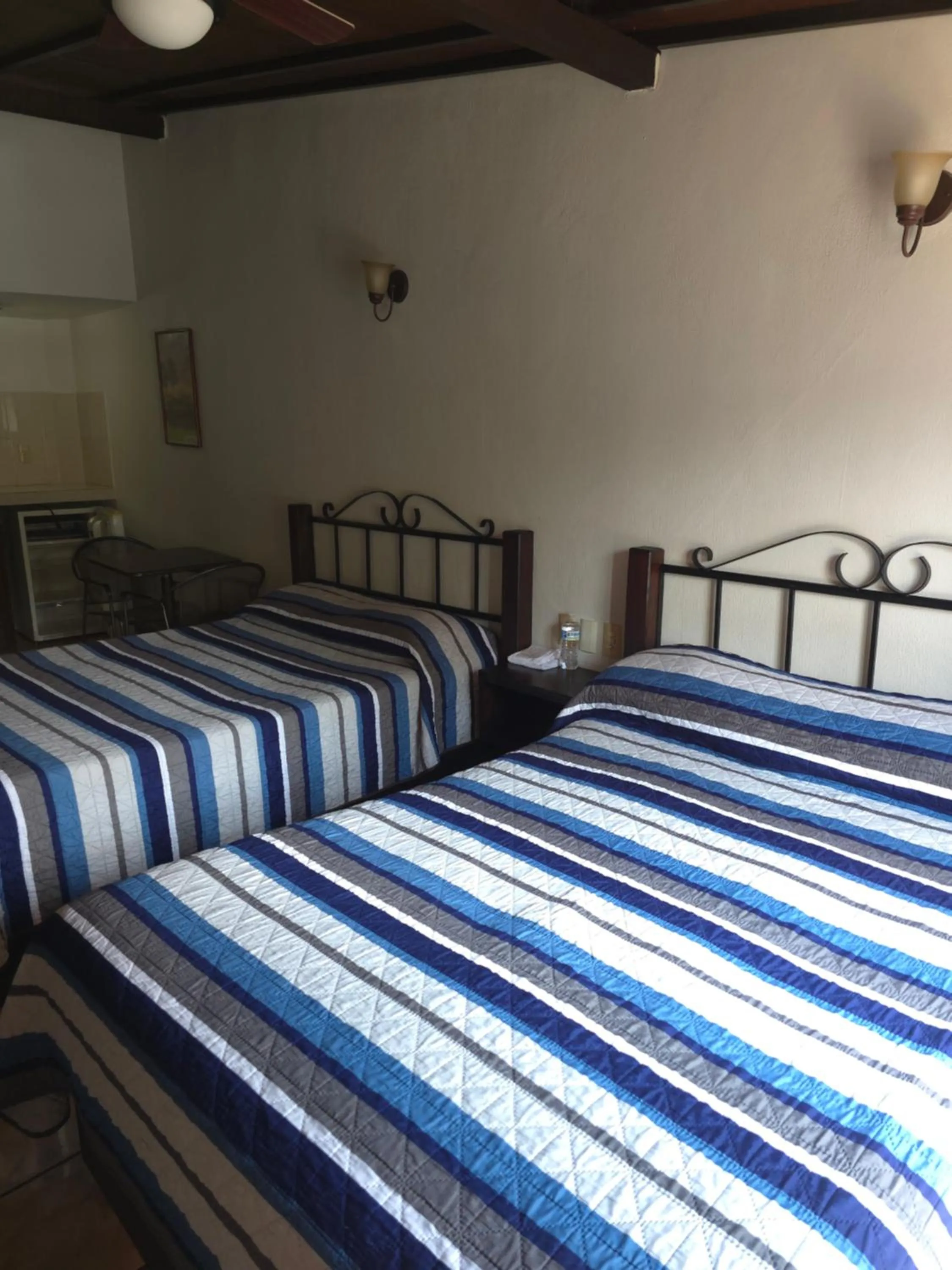 Bed in Hotel Uke Inn Terán