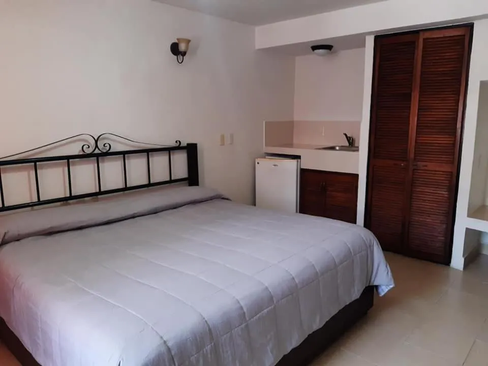 Bed in Hotel Uke Inn Terán