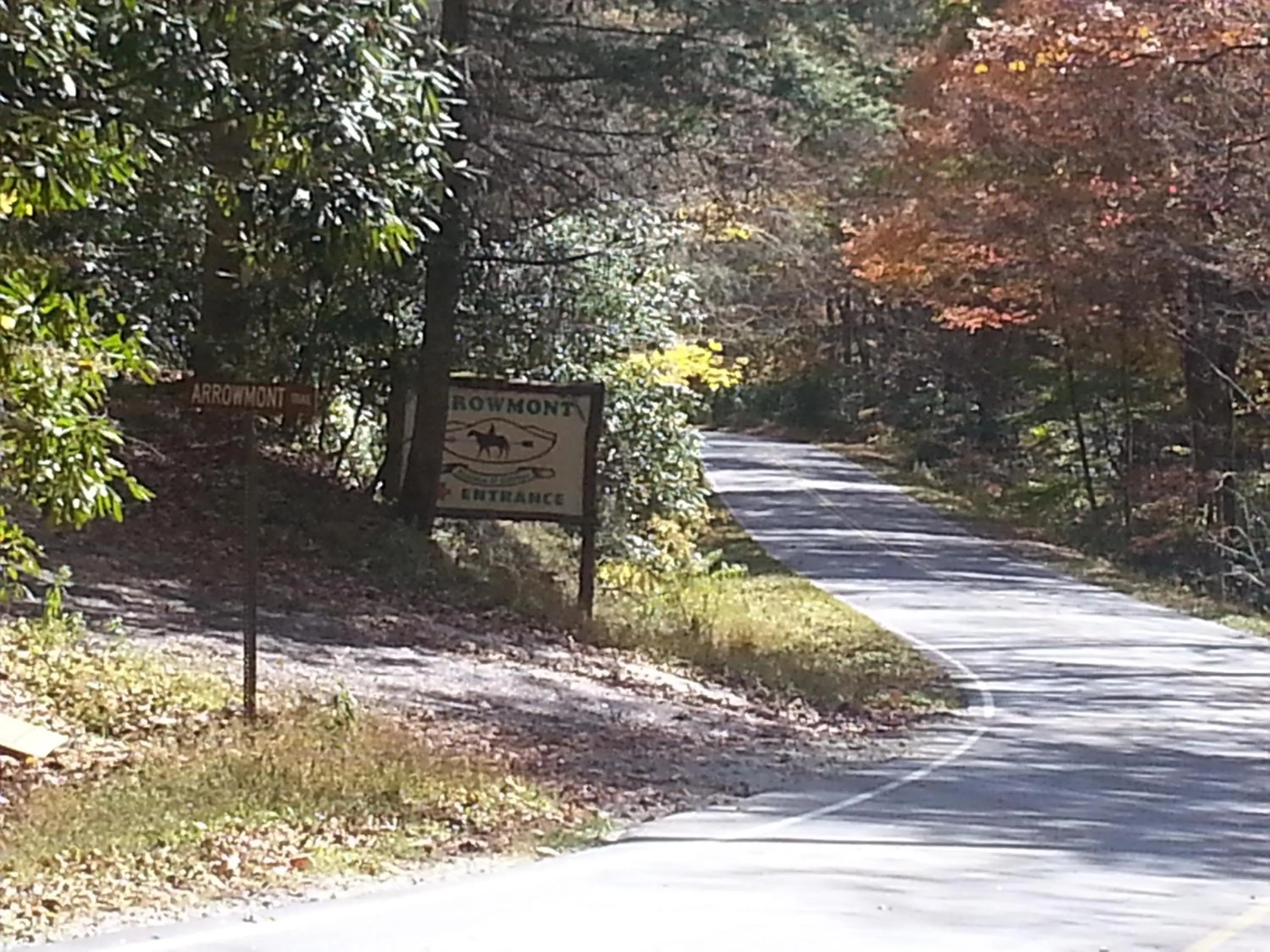 Property logo or sign in Arrowmont Stables & Cabins