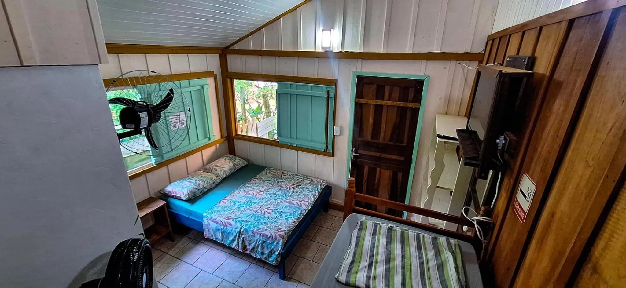 Bed in Pousada e Camping do Clodo