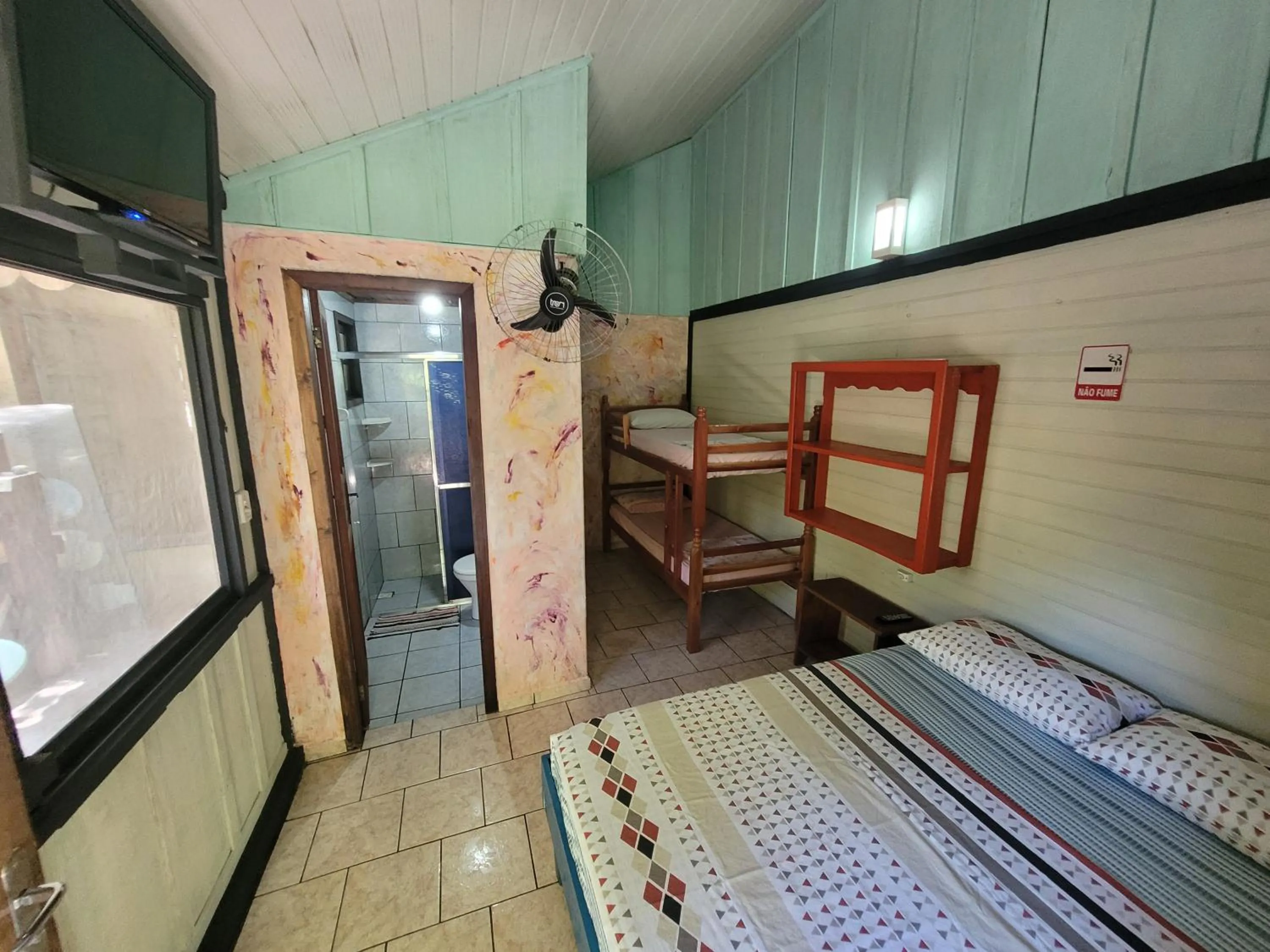 Bed in Pousada e Camping do Clodo