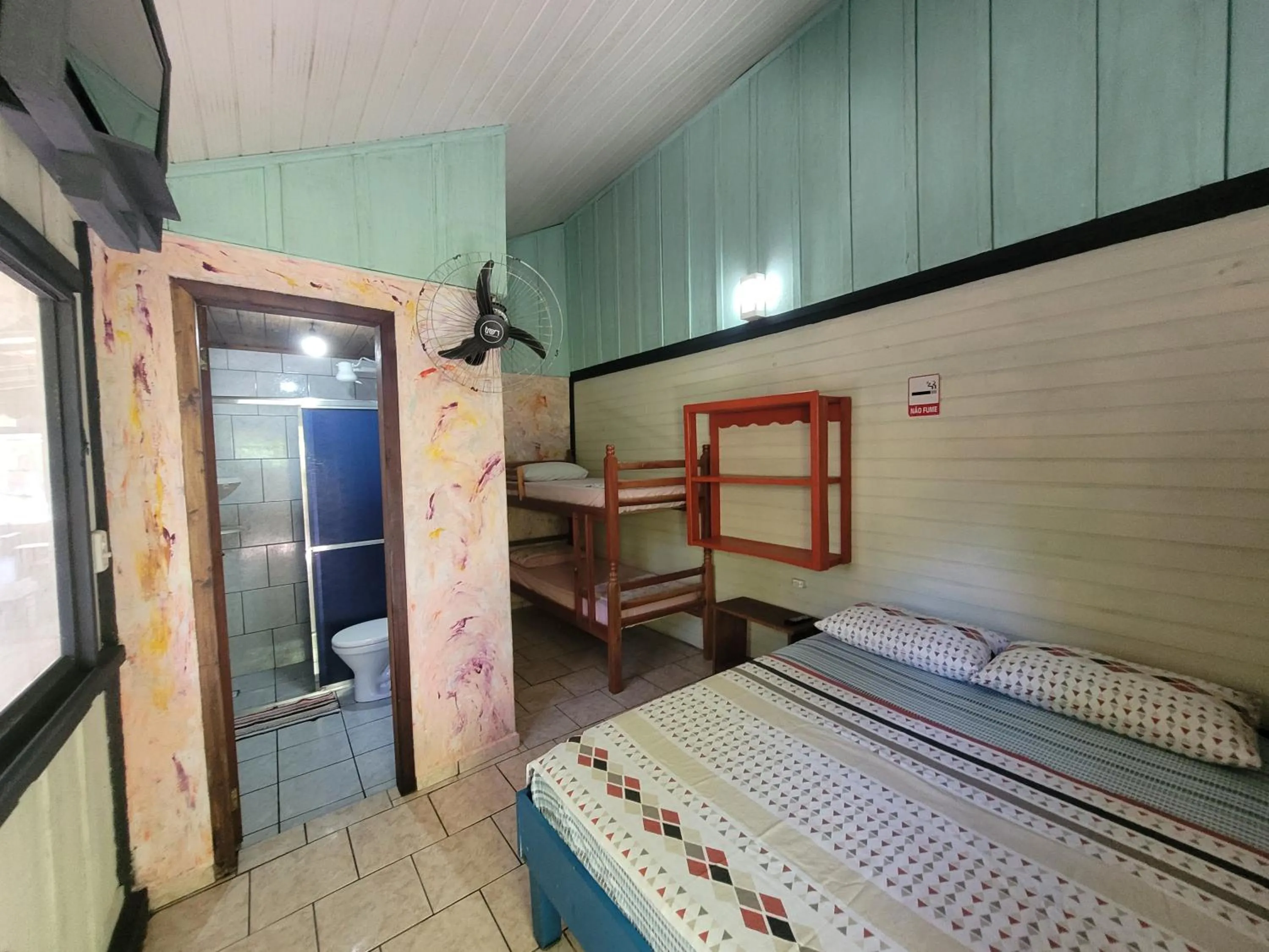 Bed in Pousada e Camping do Clodo
