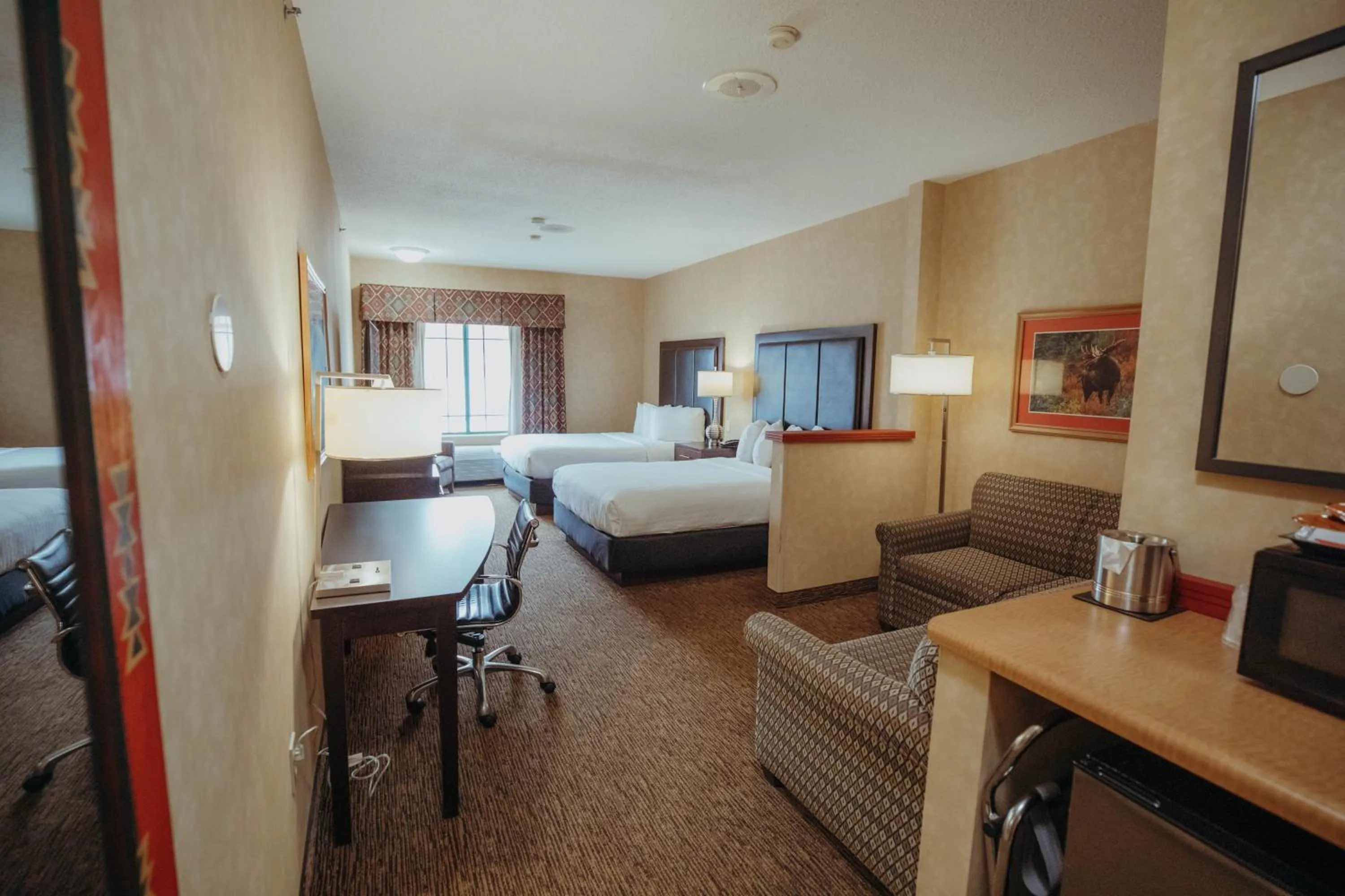 Living room, Bed in Wildwood Lodge