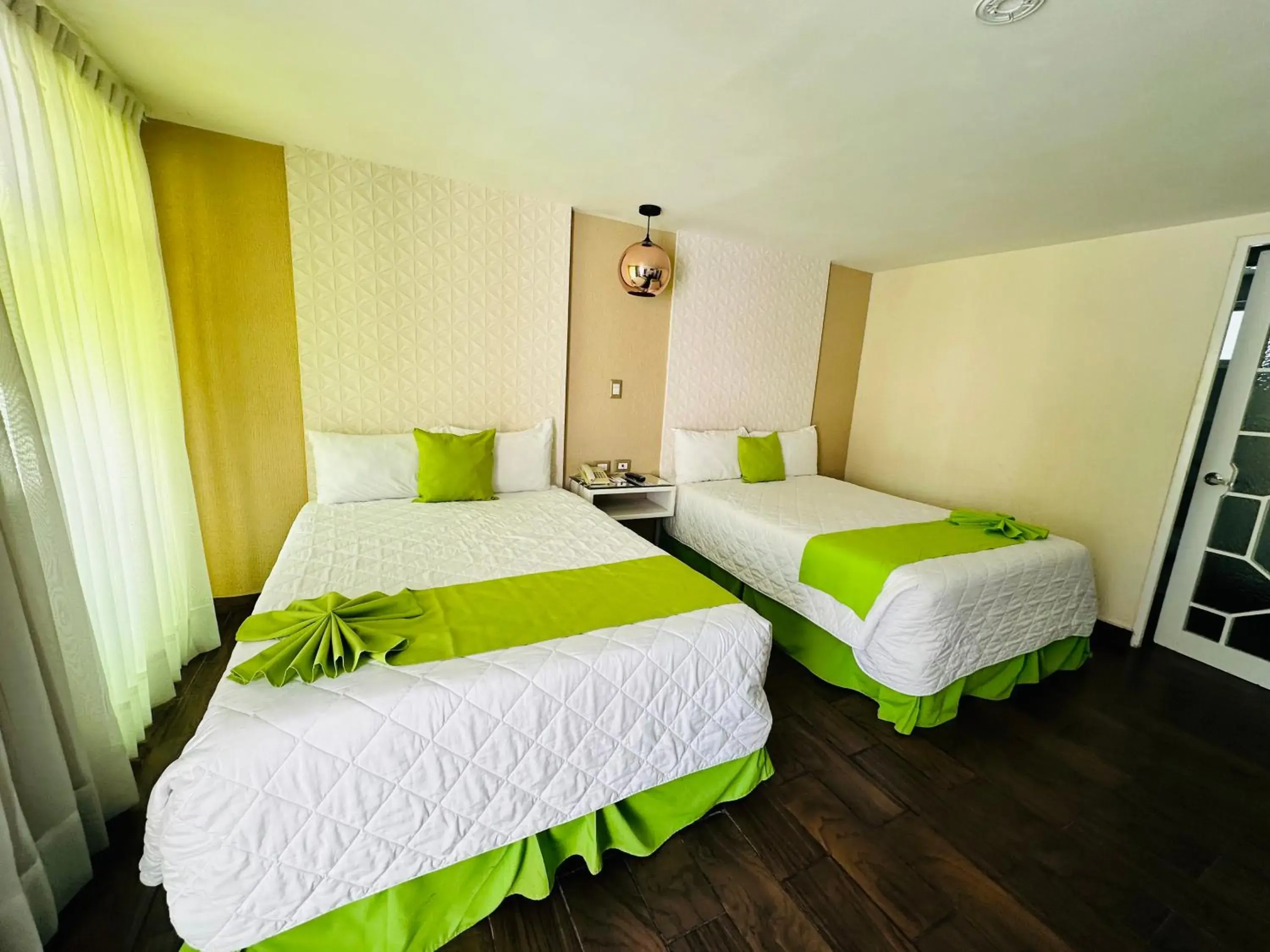 Standard Double Room with Two Double Beds in Hotel Medrano Temáticas and Business Rooms Aguascalientes Standard Double Room with Two Double Beds in Hotel Medrano Temáticas and Business Rooms Aguascalientes