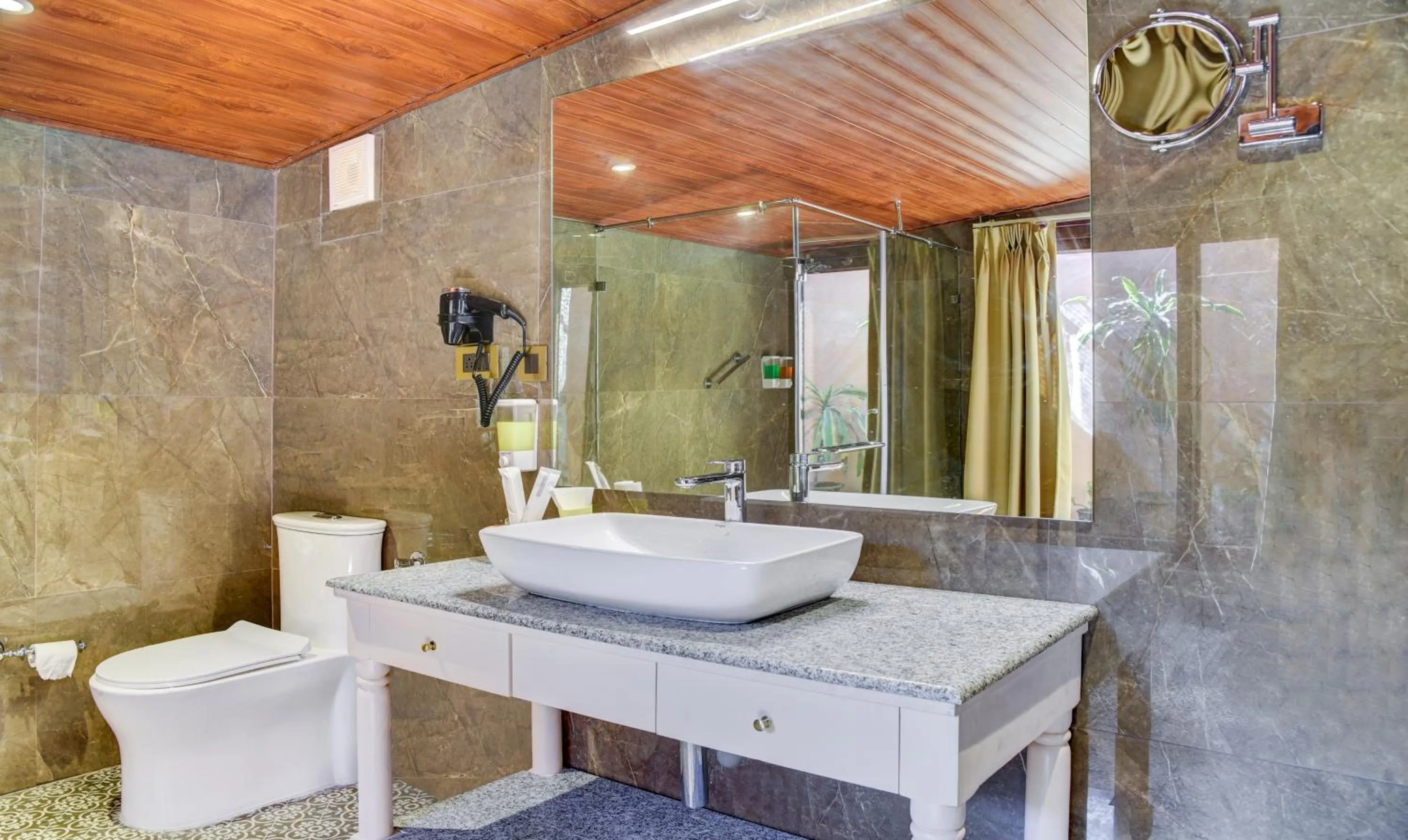 Bathroom in Treebo Premium Blue Mountain Country Club And Resort