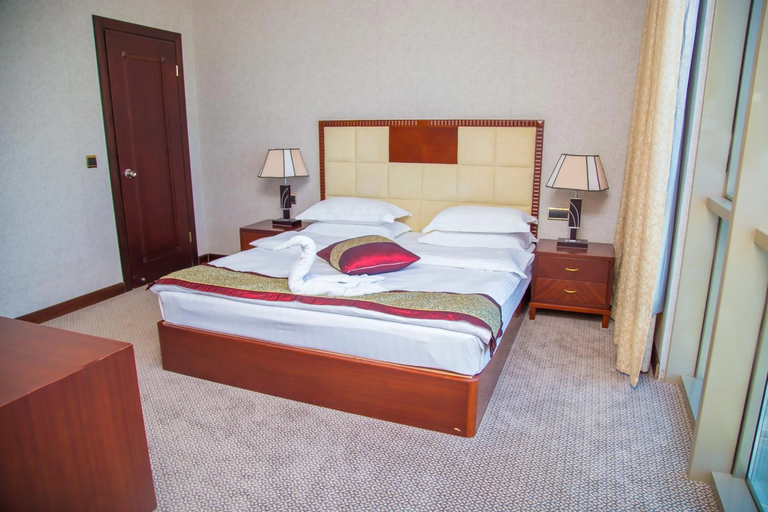 Bed in Golden Coast Hotel