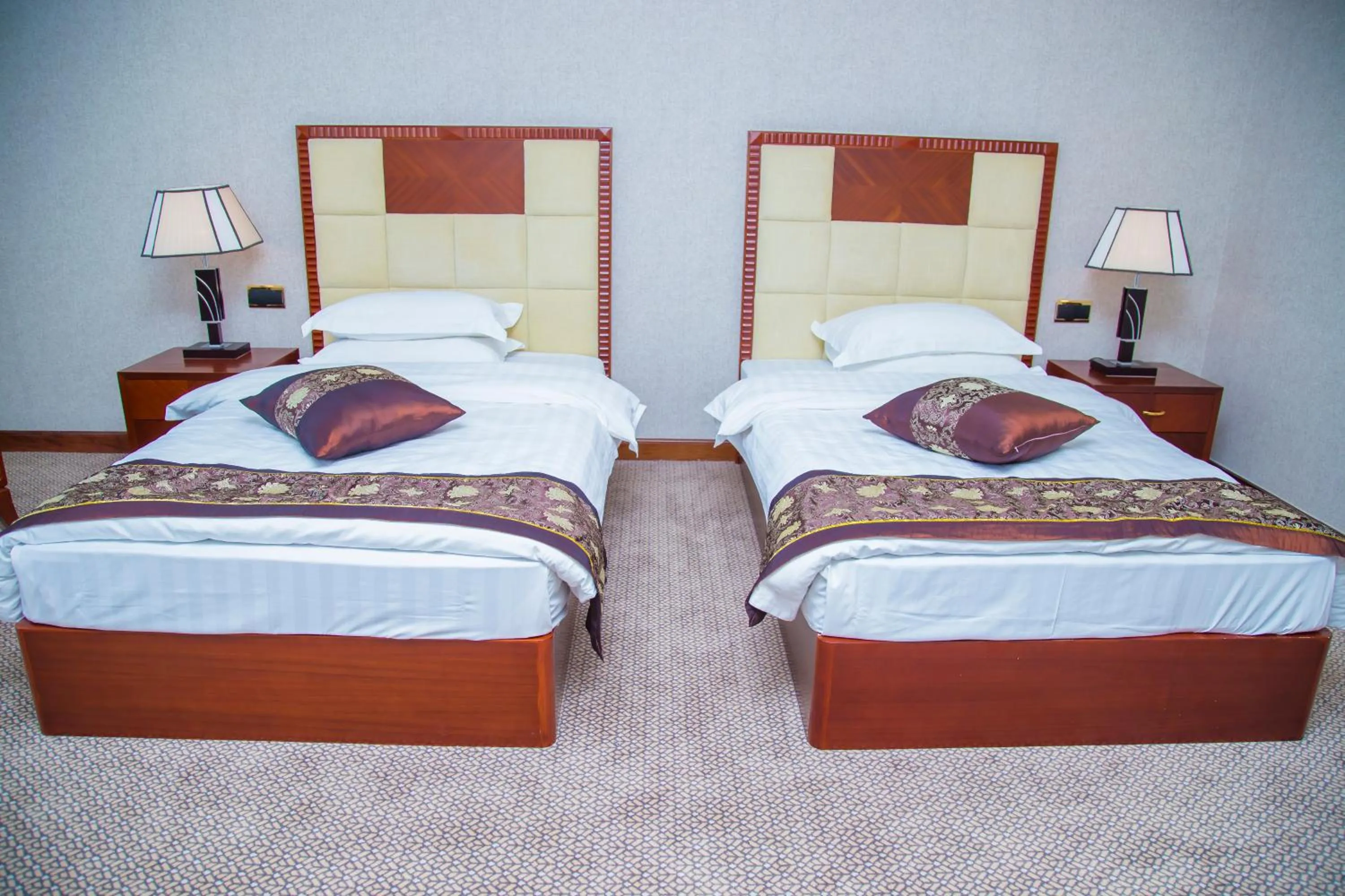Bed in Golden Coast Hotel