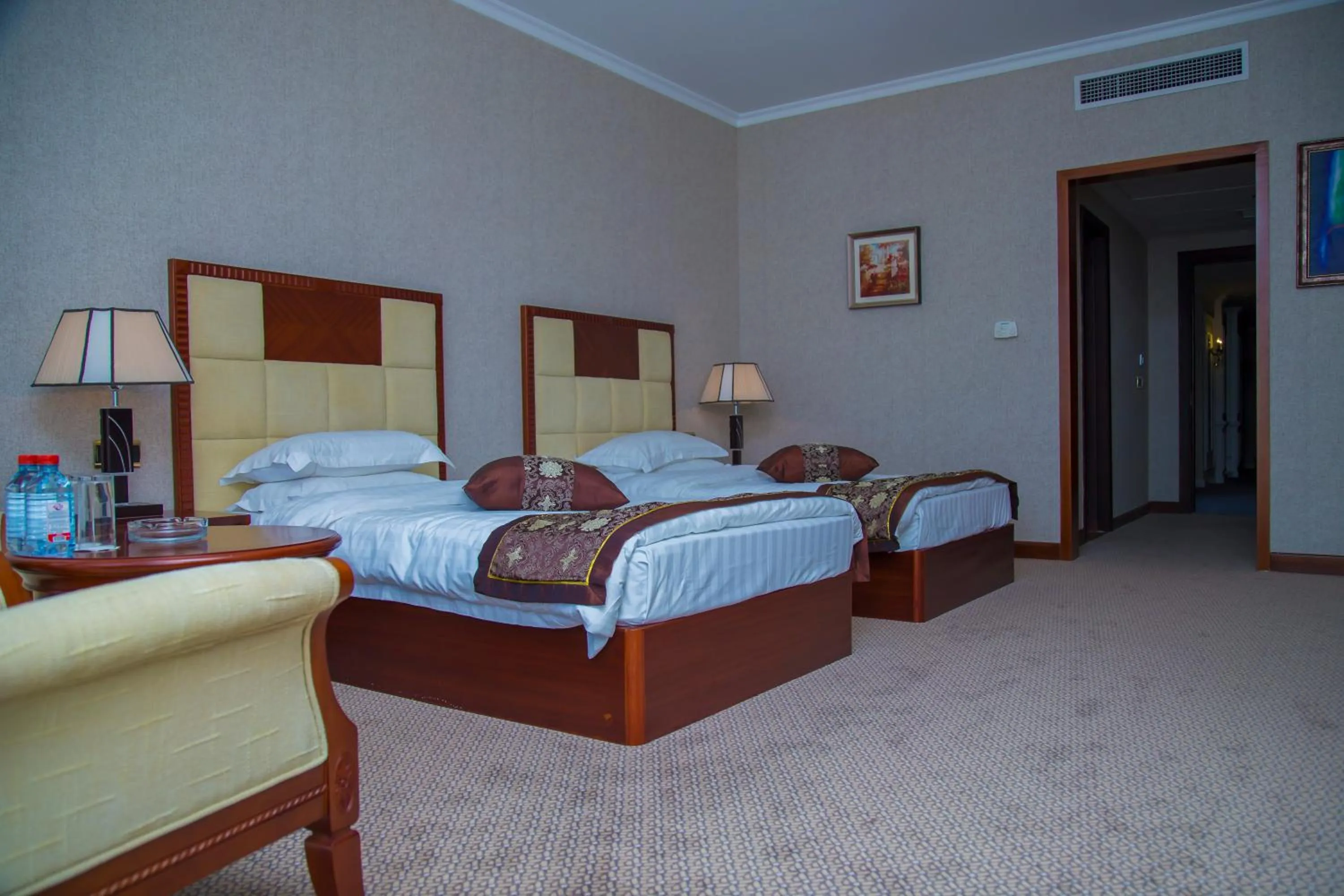 Photo of the whole room, Bed in Golden Coast Hotel