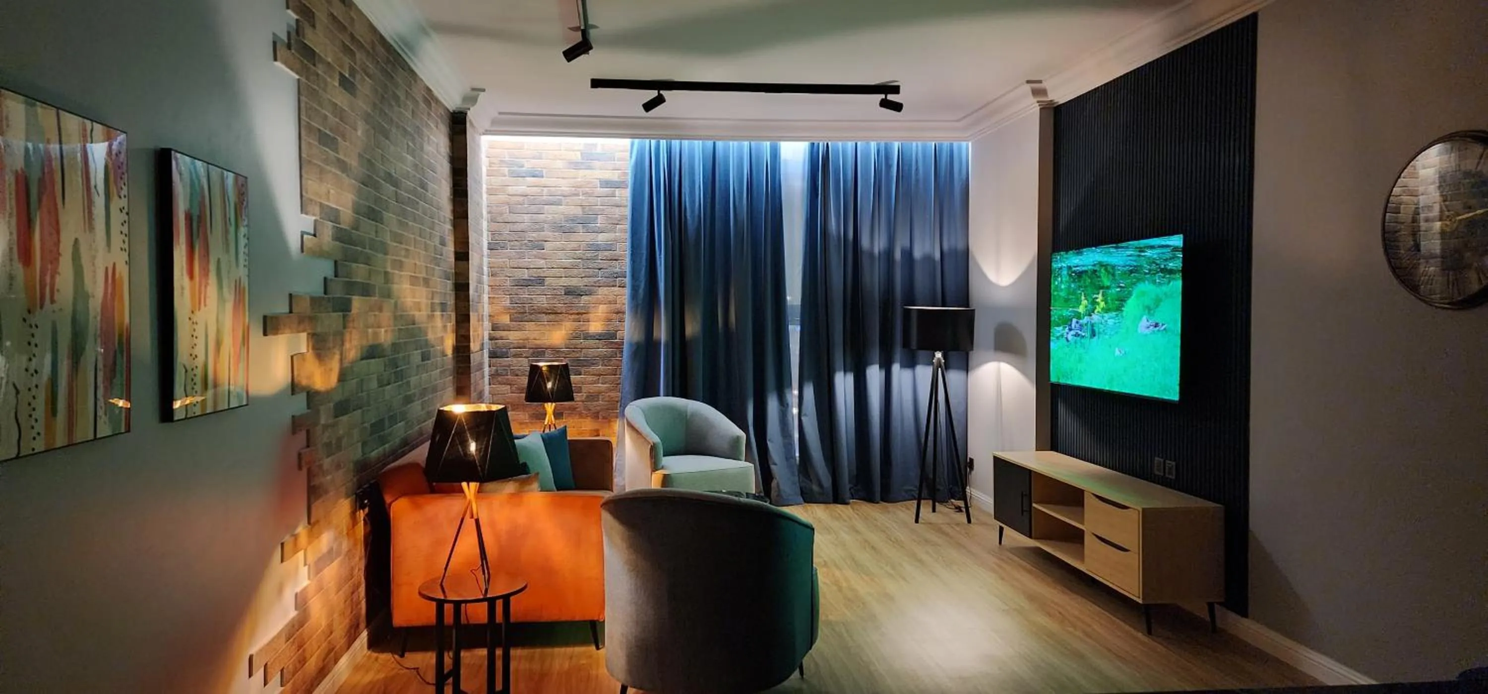 Communal lounge/ TV room in Qasr Al Sahab