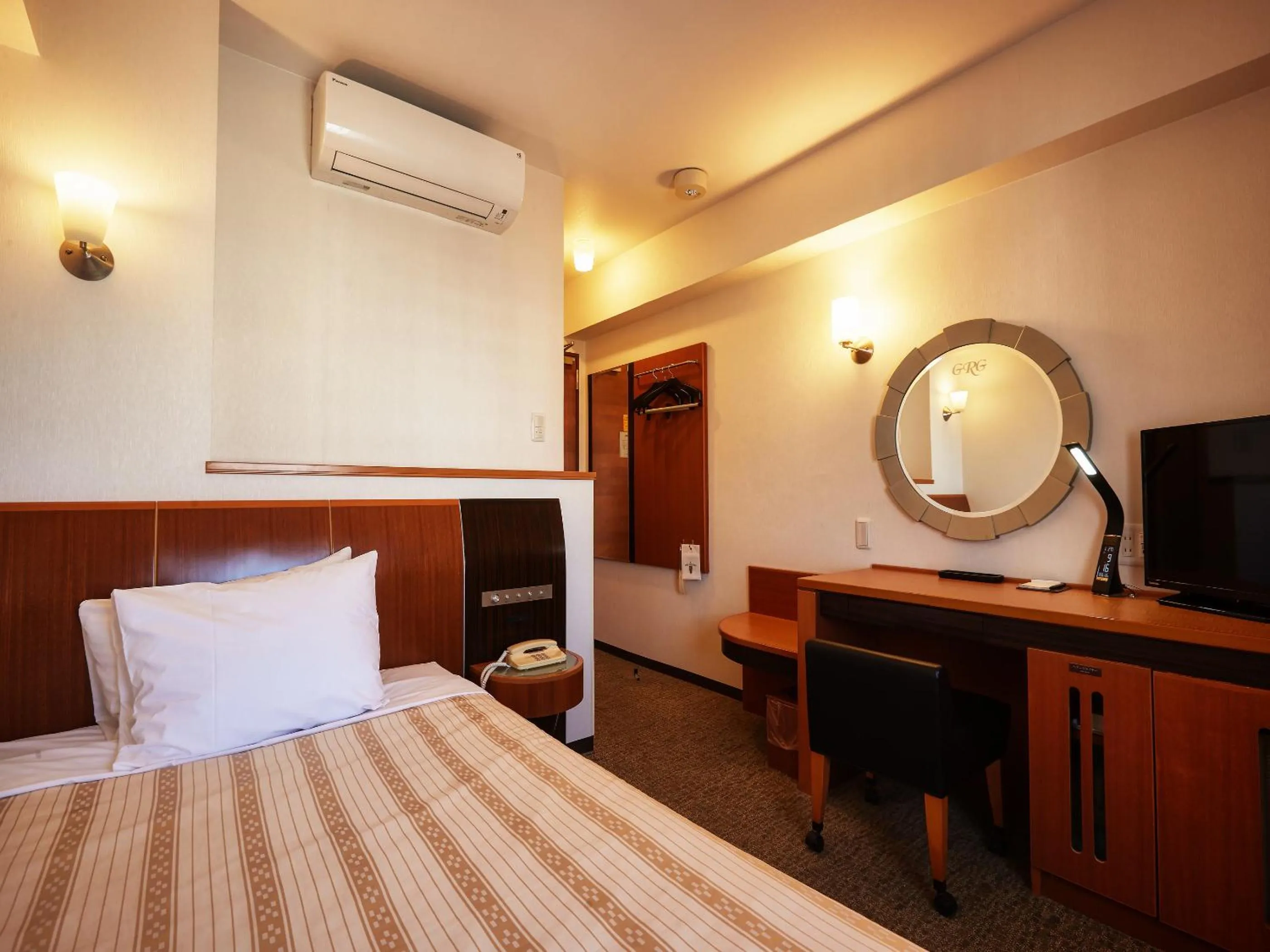 Photo of the whole room, Bed in GRG Hotel Naha Higashimachi