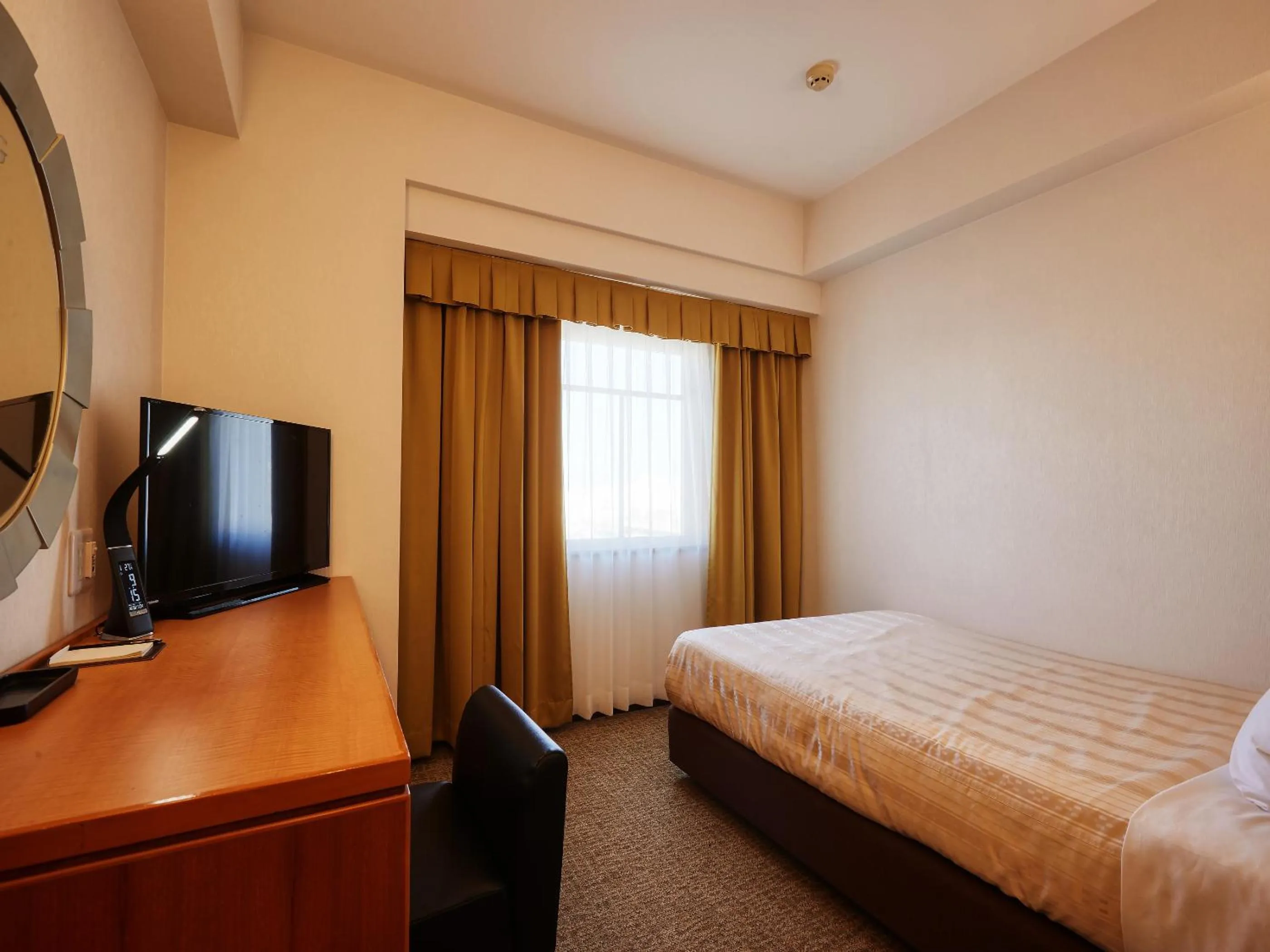 Photo of the whole room, Bed in GRG Hotel Naha Higashimachi