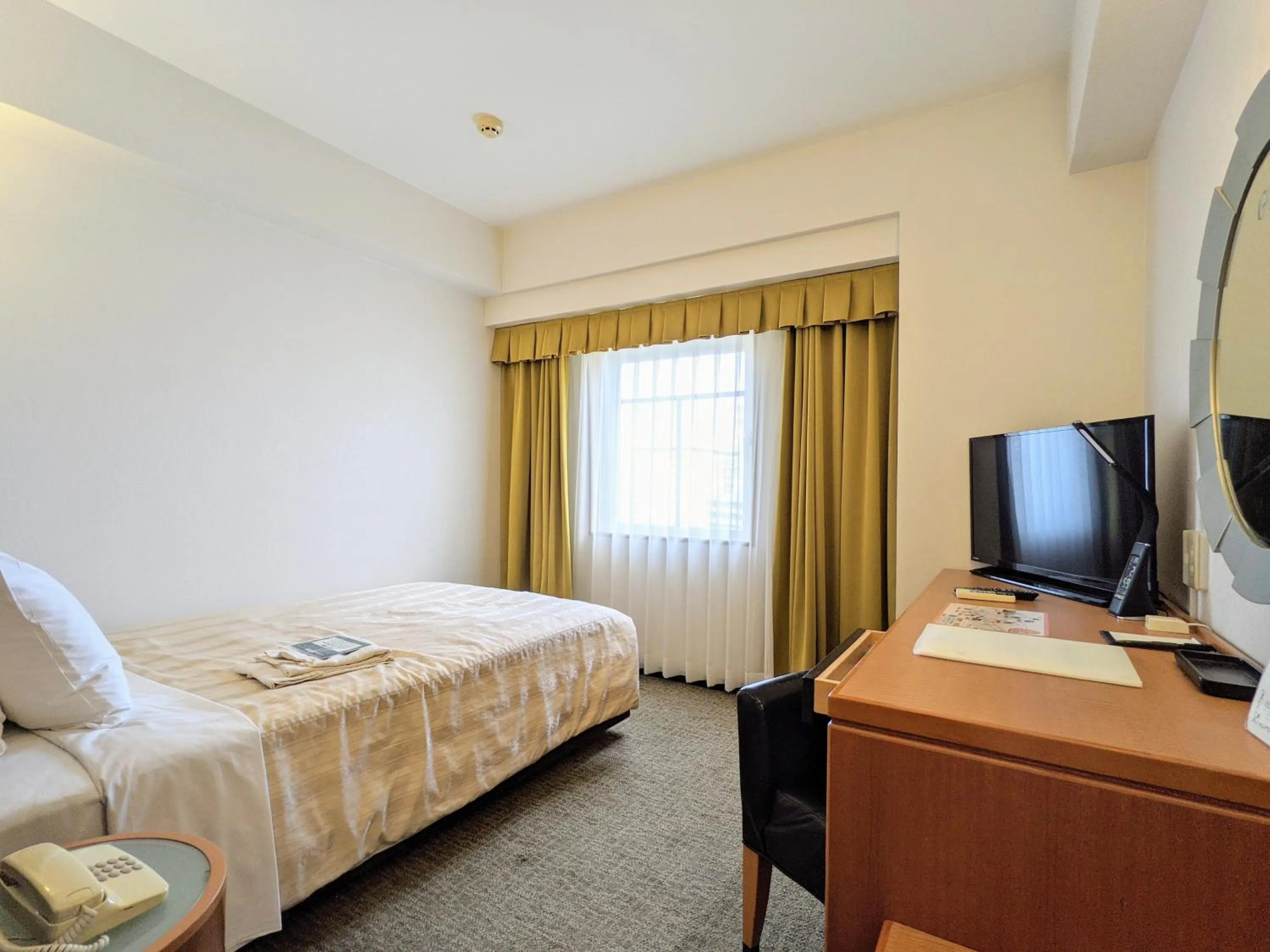 Bed in GRG Hotel Naha Higashimachi