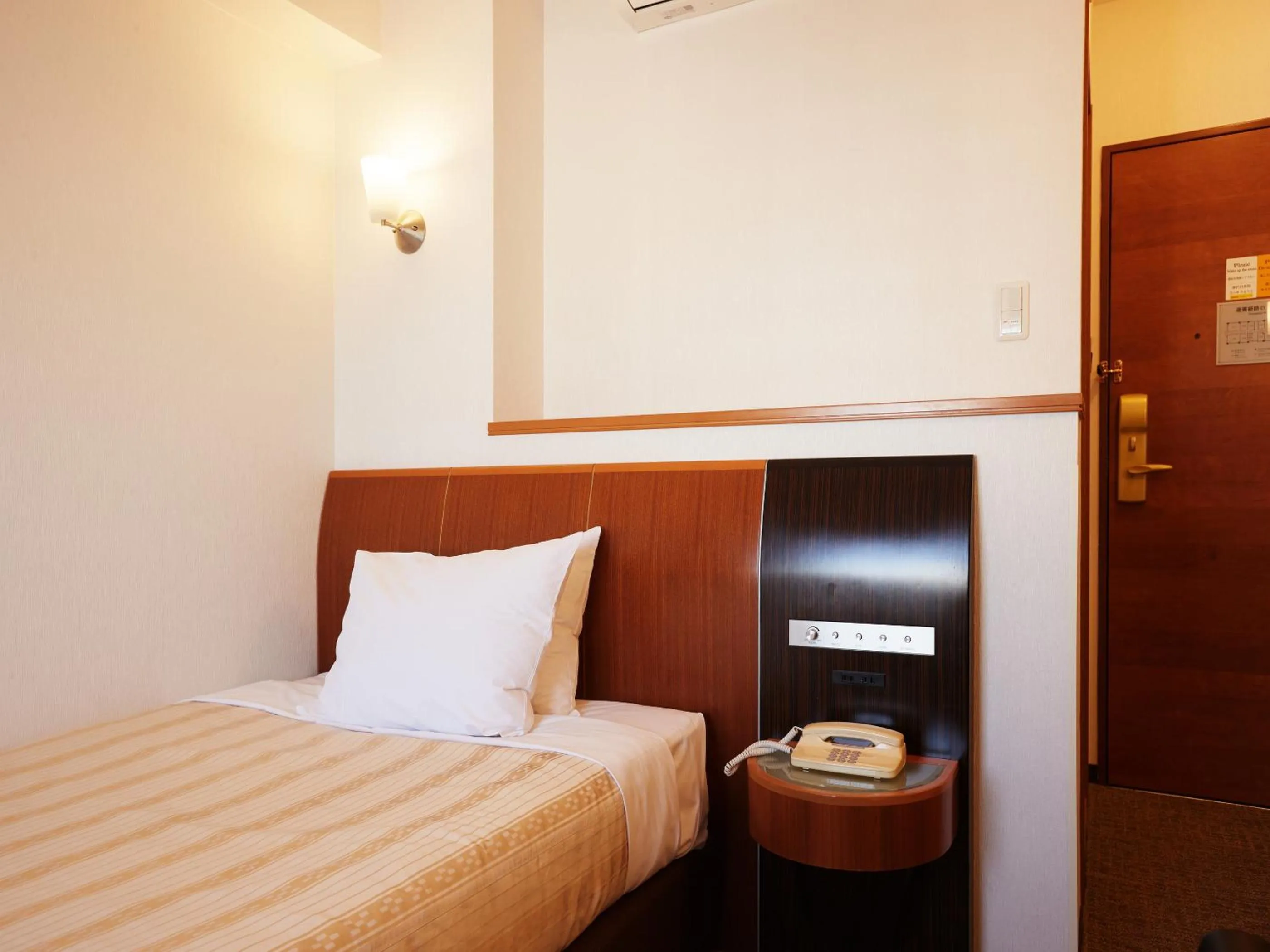 Photo of the whole room, Bed in GRG Hotel Naha Higashimachi