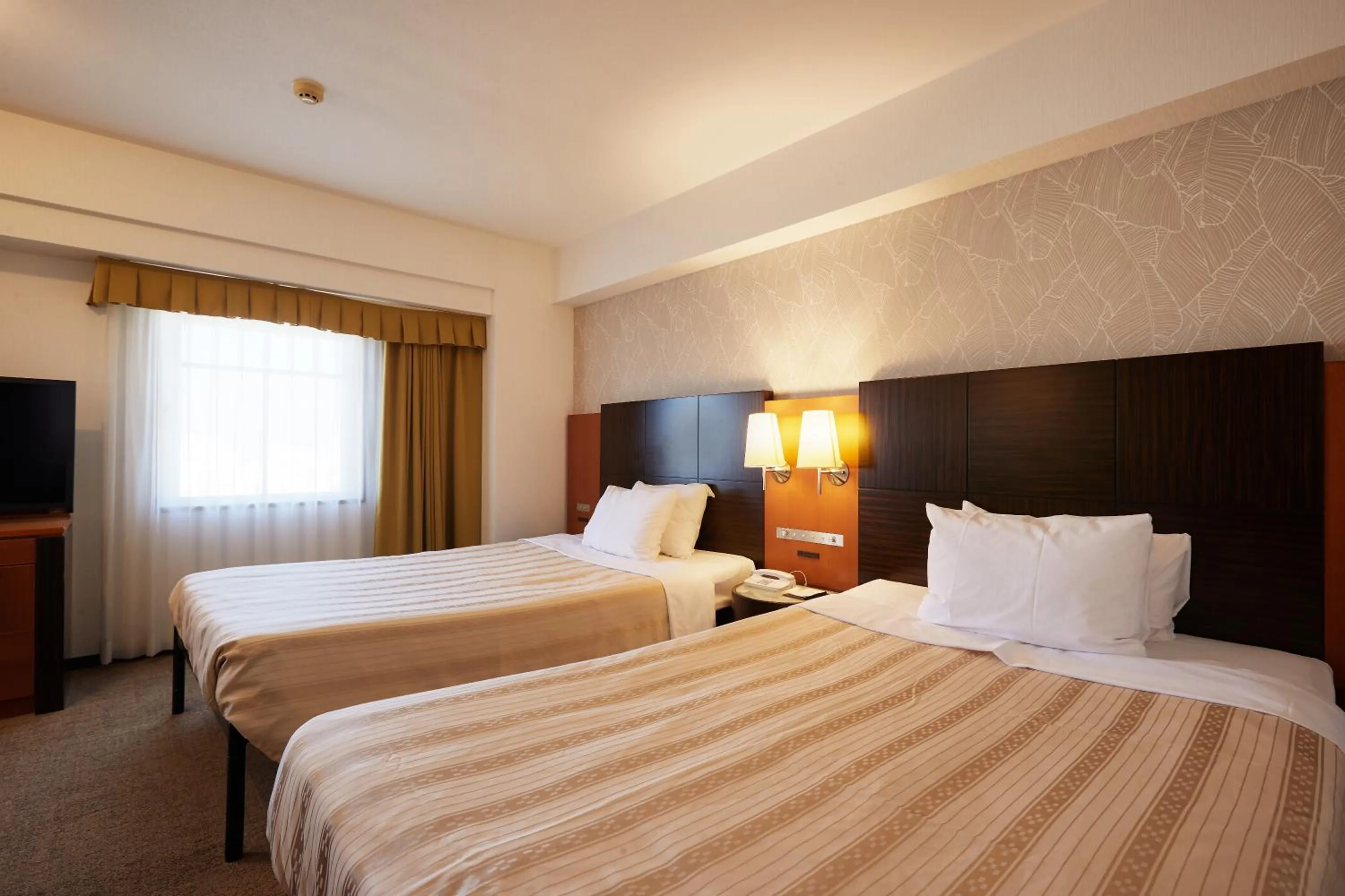 Bed in GRG Hotel Naha Higashimachi