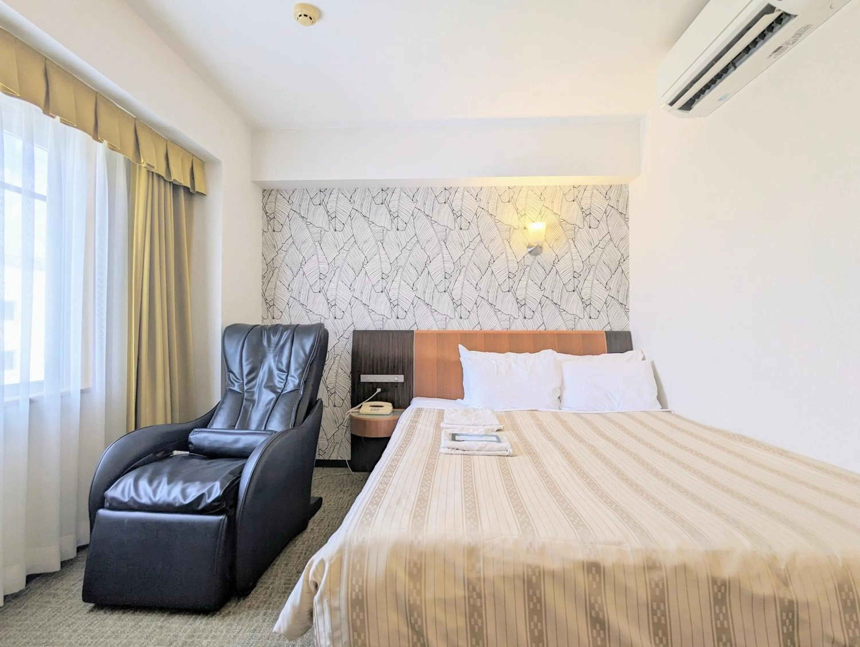 Bed in GRG Hotel Naha Higashimachi