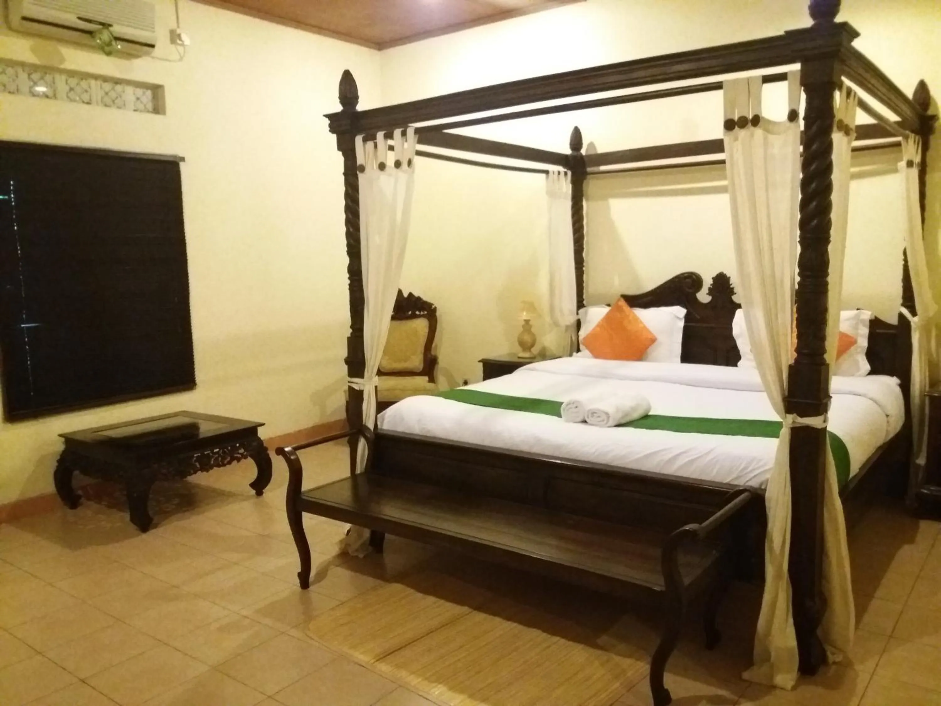 Bed in Alam Jogja Resort Mitra RedDoorz