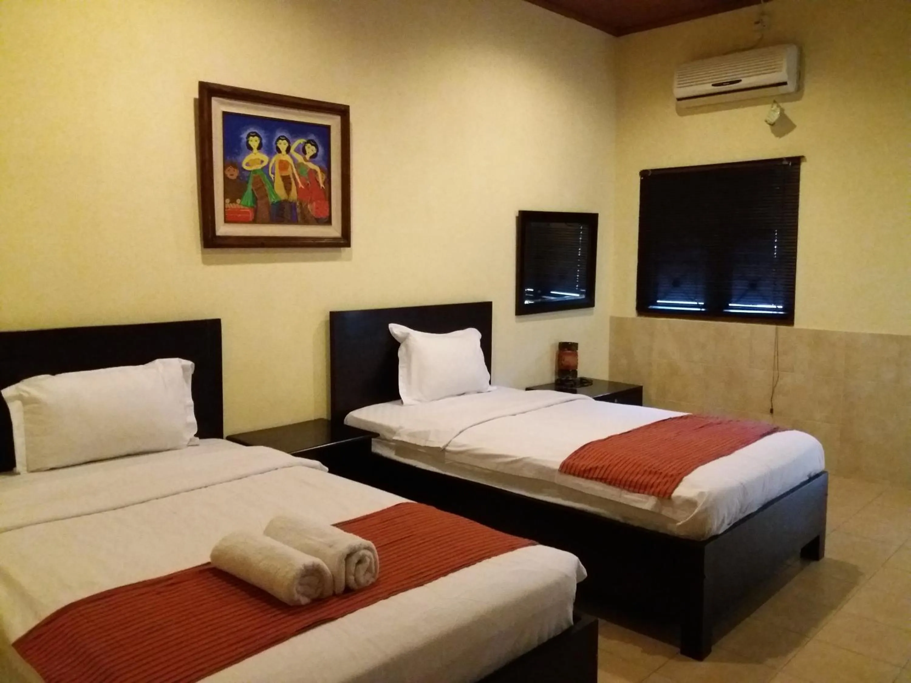 Bed in Alam Jogja Resort Mitra RedDoorz