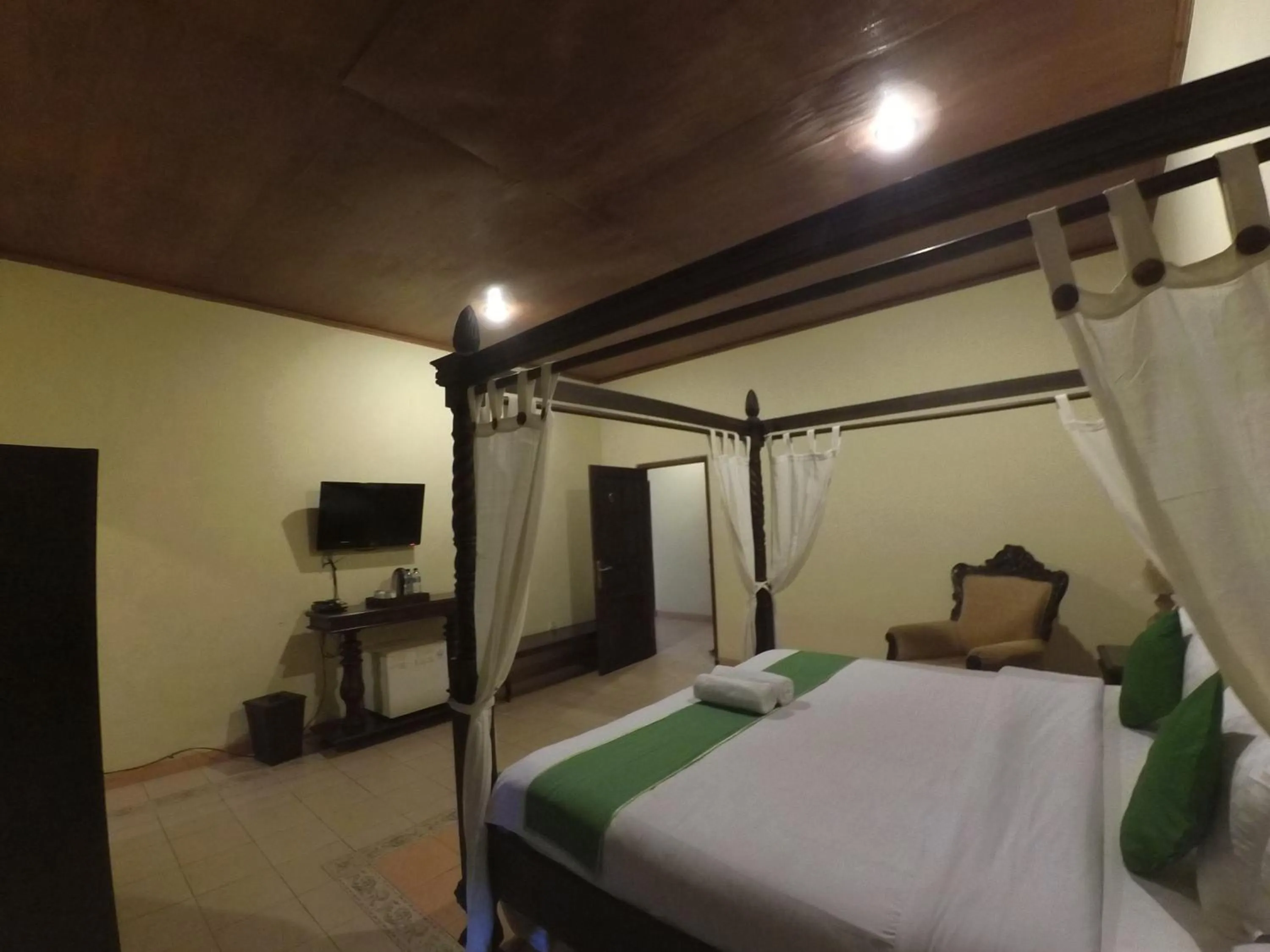 Bed in Alam Jogja Resort Mitra RedDoorz