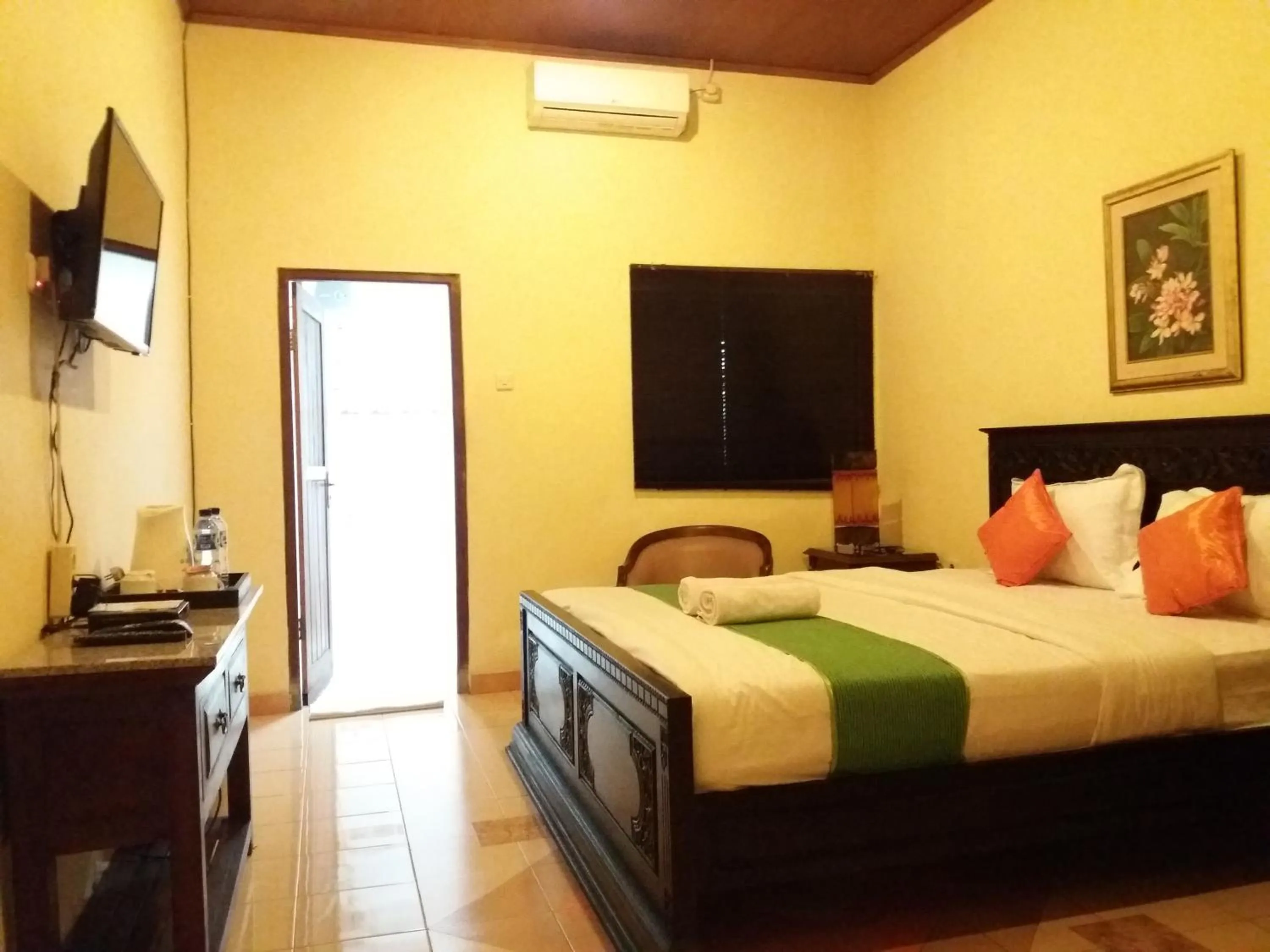 Bed in Alam Jogja Resort Mitra RedDoorz