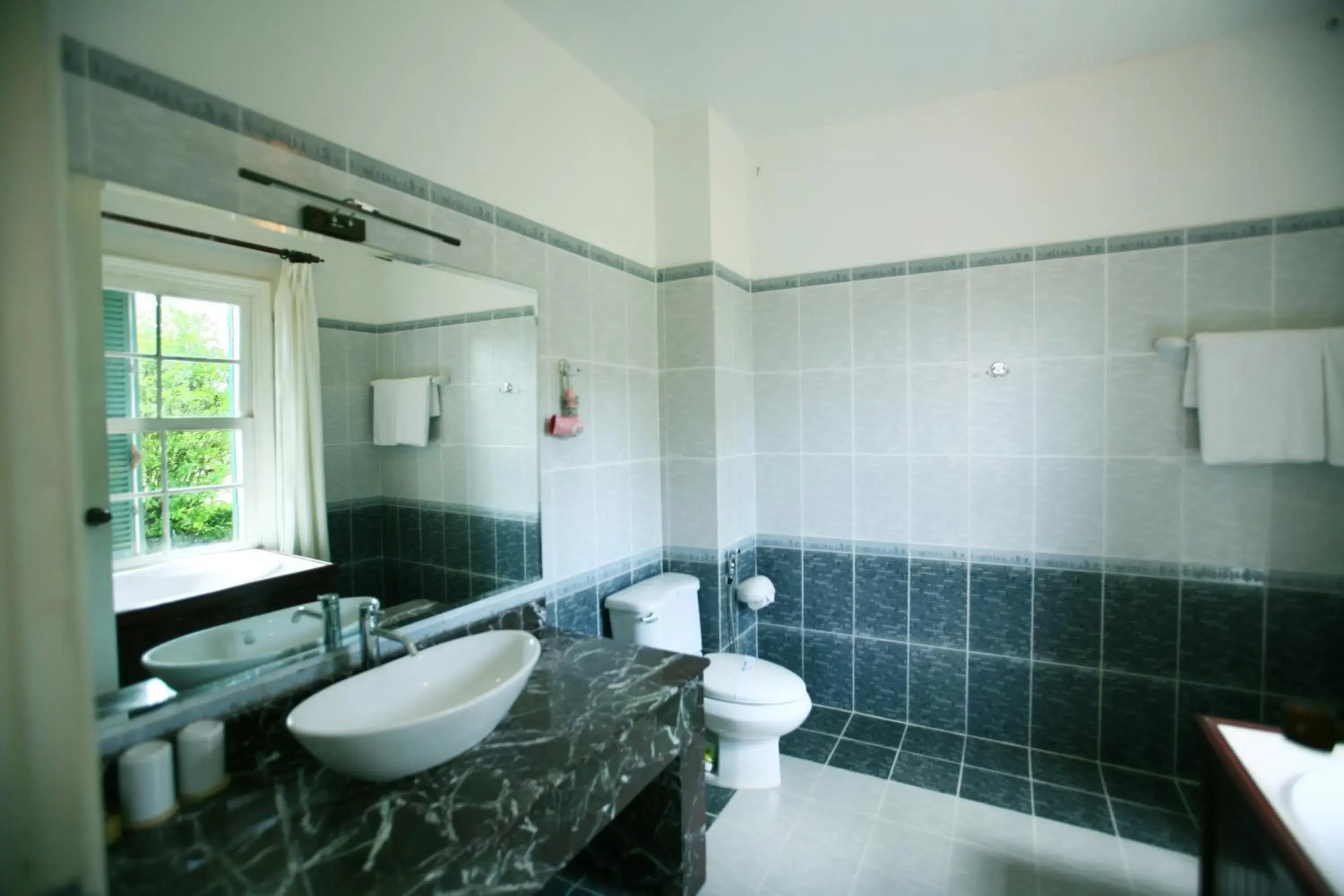 Bathroom in Dalat Cadasa Resort Bathroom in Dalat Cadasa Resort