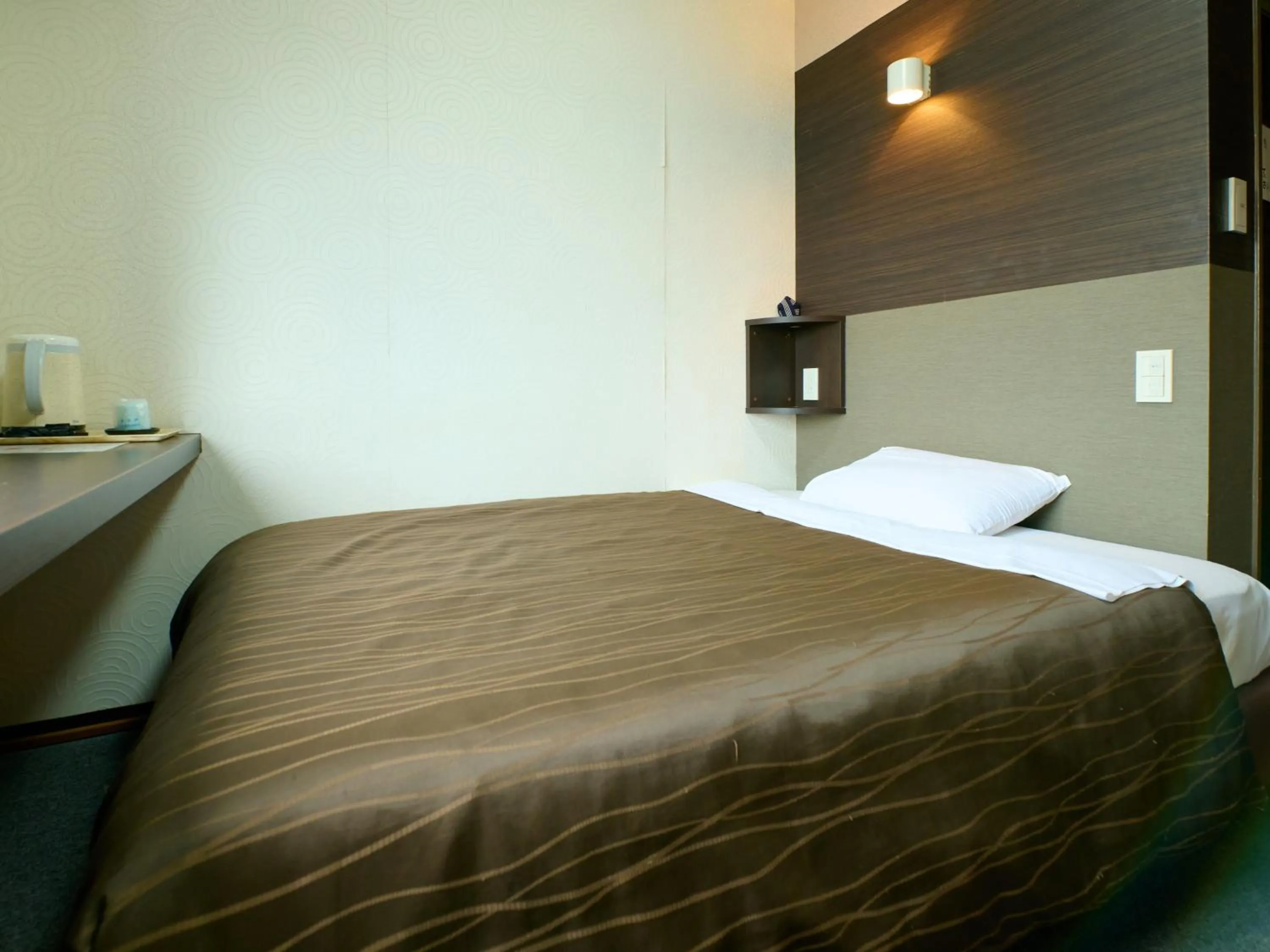 Bed in Tabist Hotel Seishokan