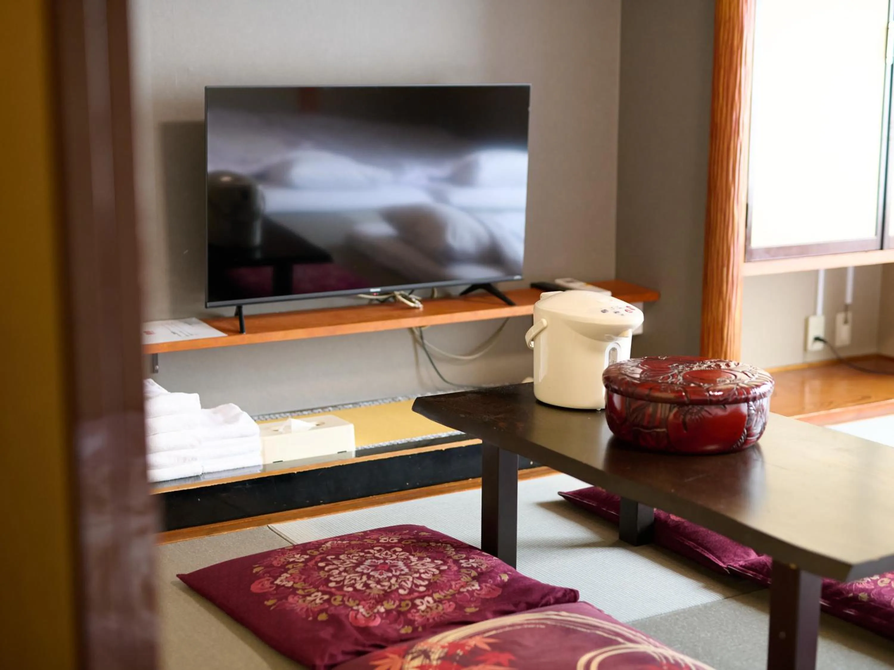 Communal lounge/ TV room in Tabist Hotel Seishokan