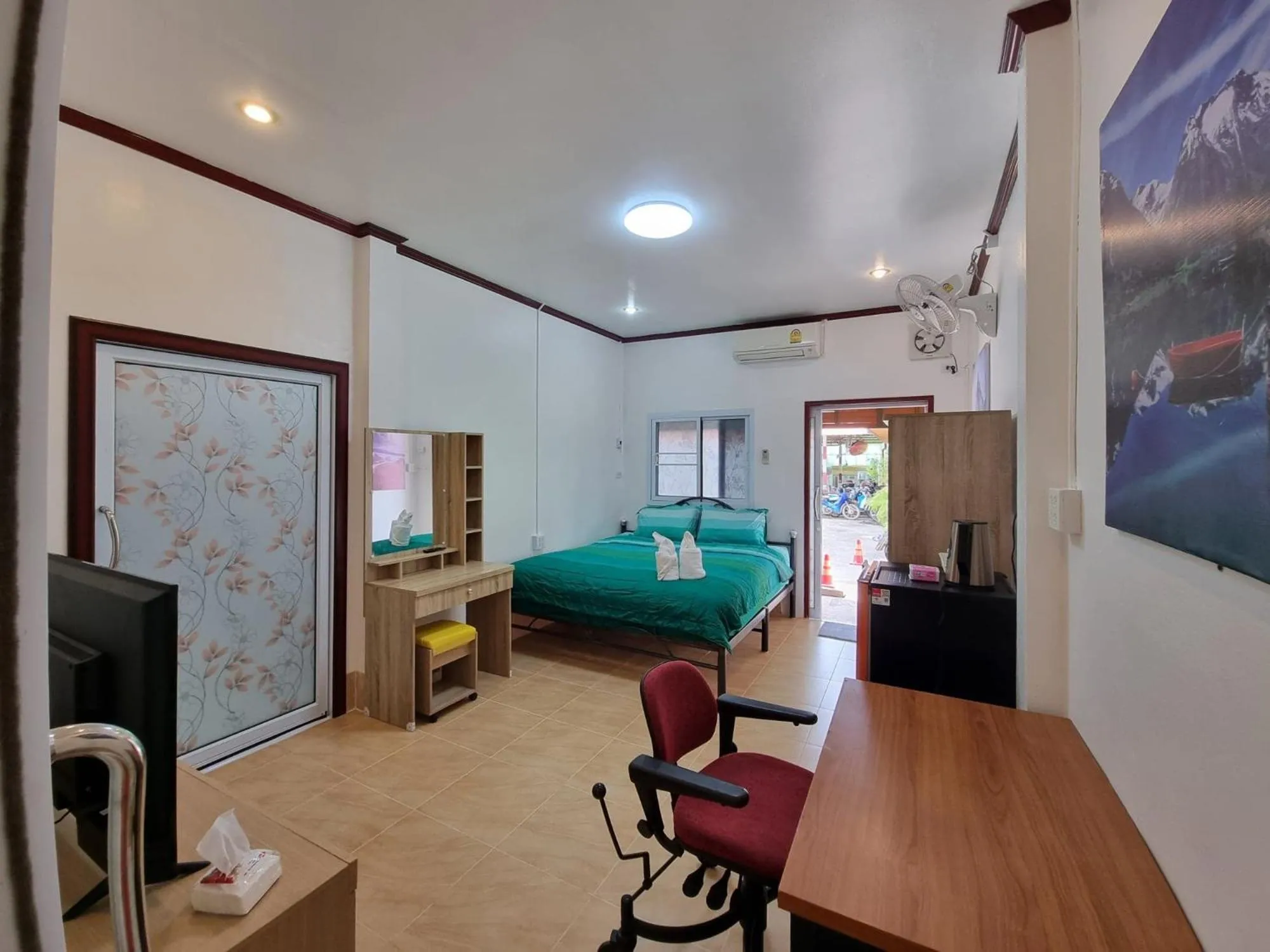 Bed in Baan Sabaijai Resort