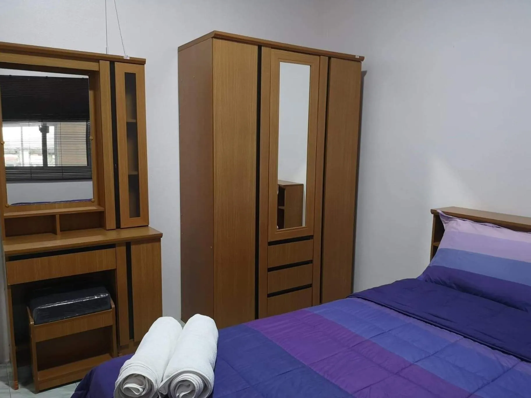 Bed in Baan Sabaijai Resort