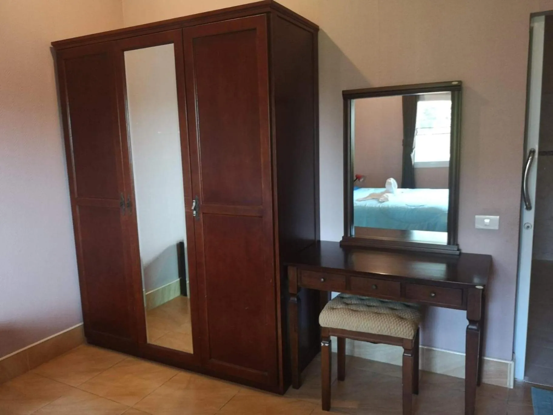 Bed in Baan Sabaijai Resort