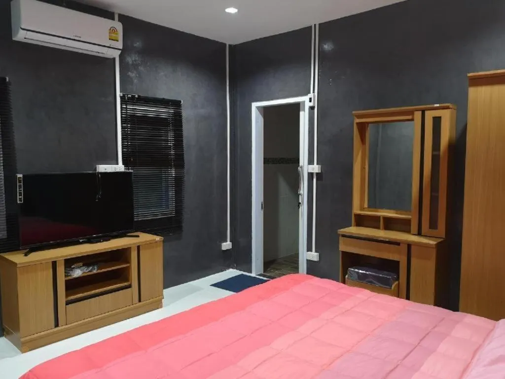 Bed in Baan Sabaijai Resort