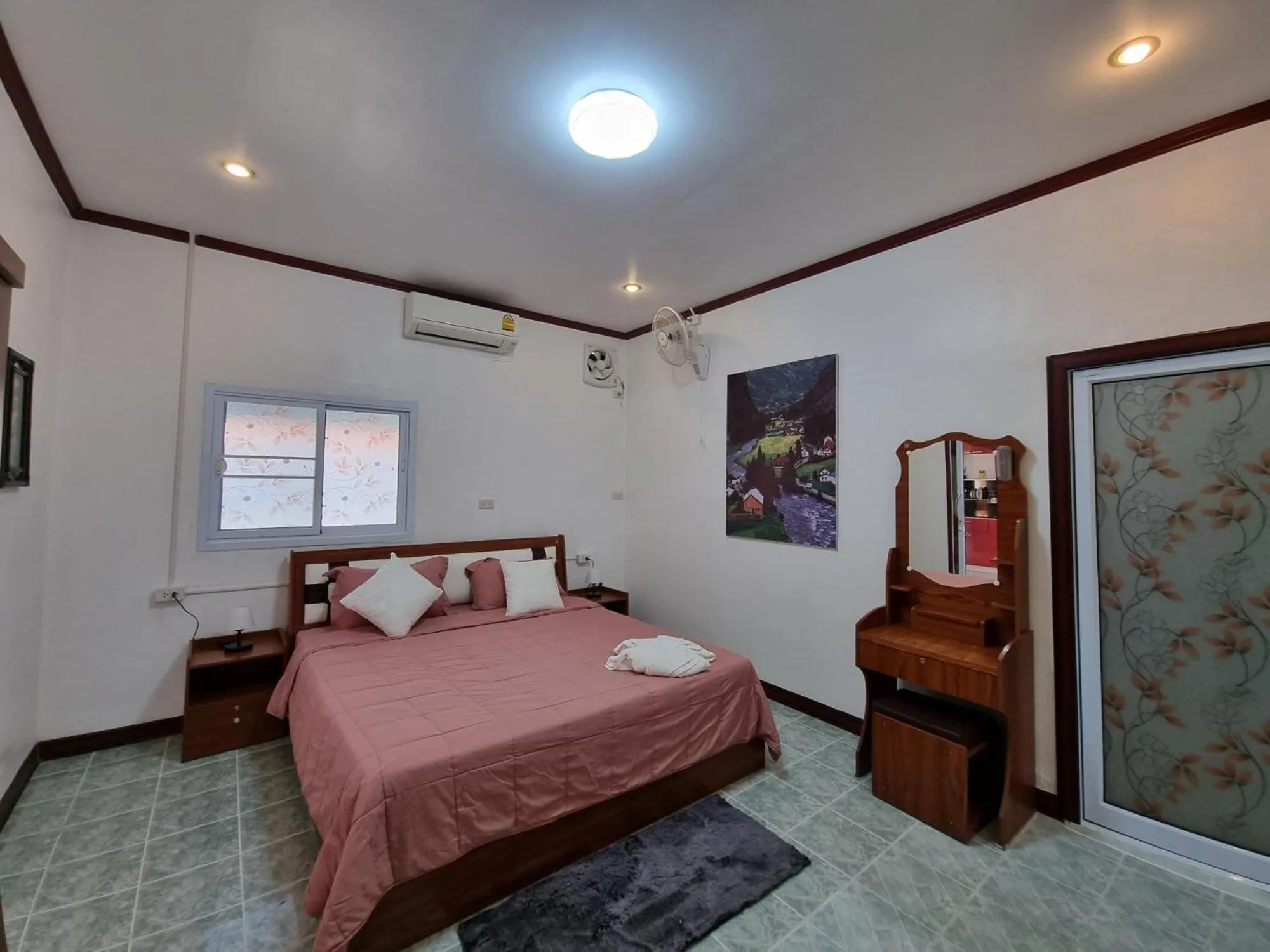 Bed in Baan Sabaijai Resort