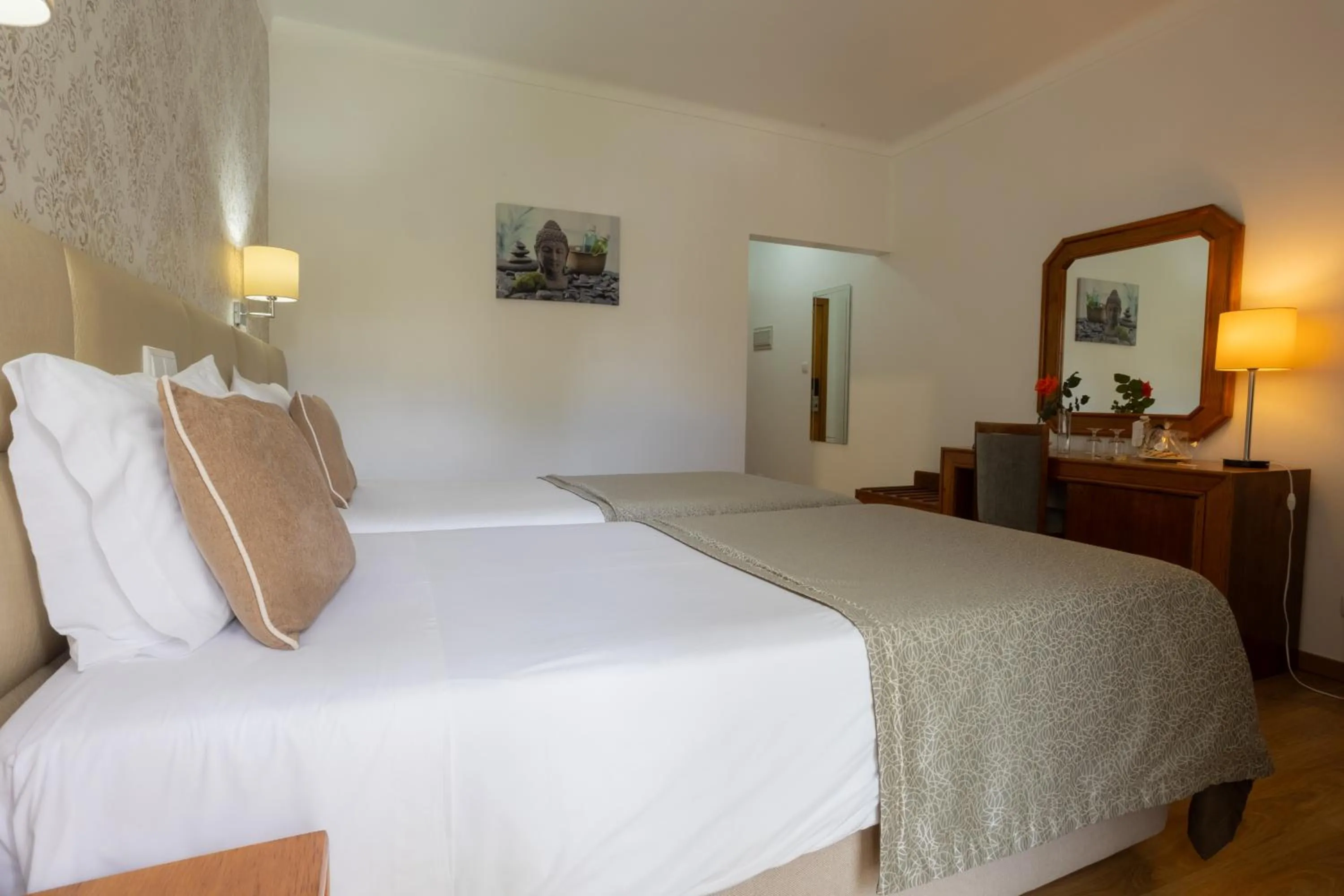 Bed in Hotel Sao Jorge Garden