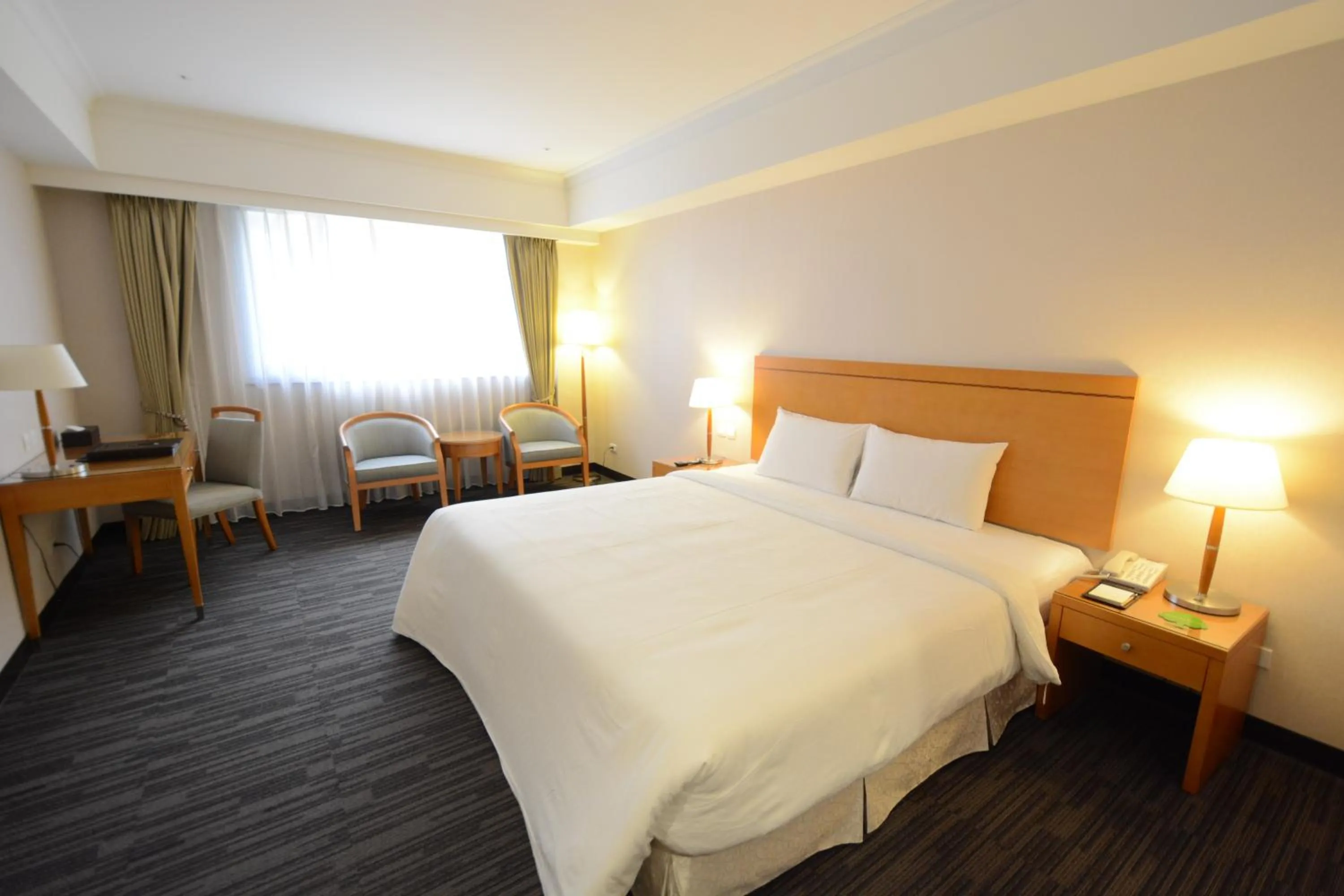 Photo of the whole room, Bed in Fushin Hotel Taichung