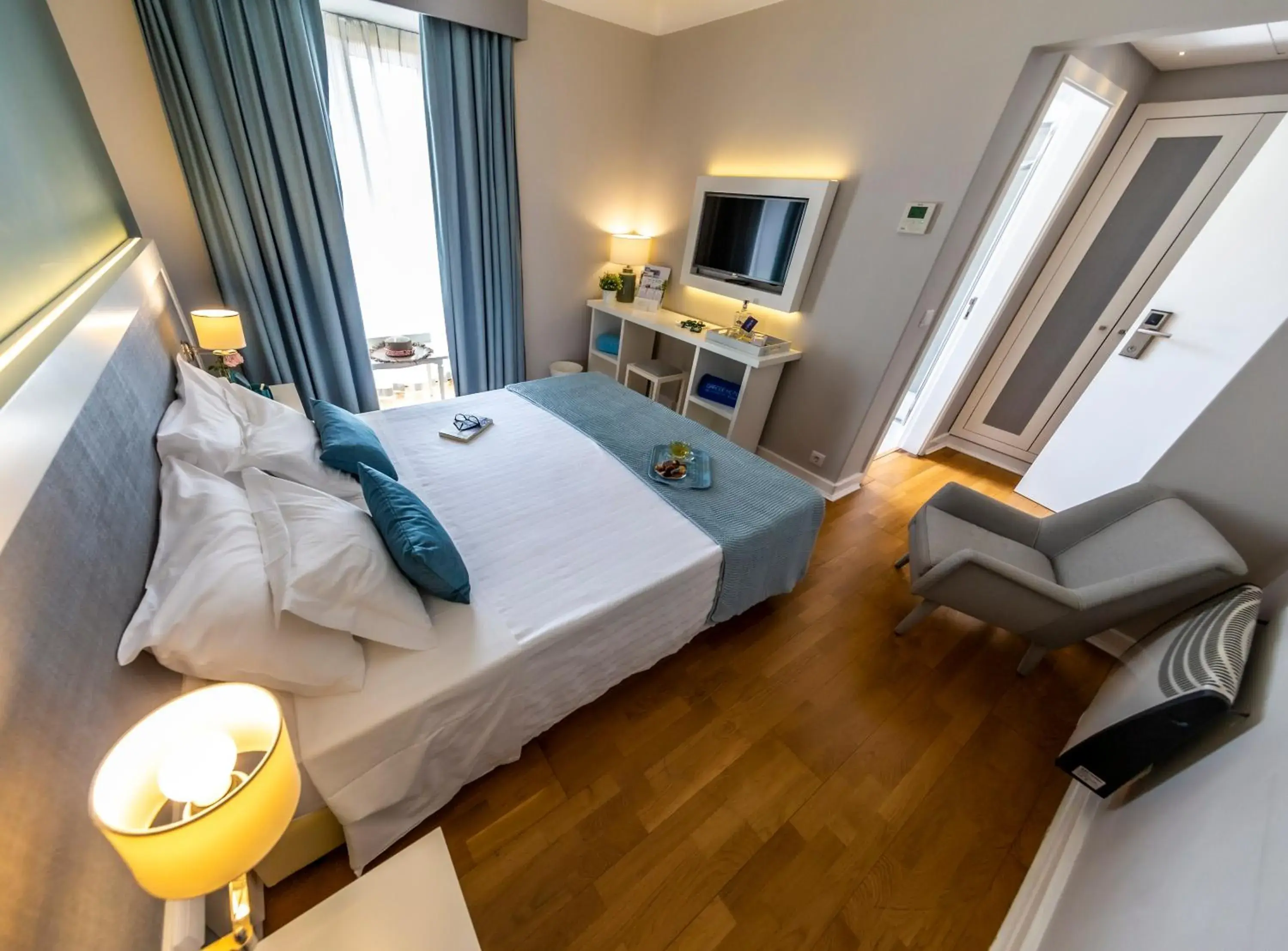 Communal lounge/ TV room, Bed in Grande Hotel das Caldas da Felgueira Communal lounge/ TV room, Bed in Grande Hotel das Caldas da Felgueira